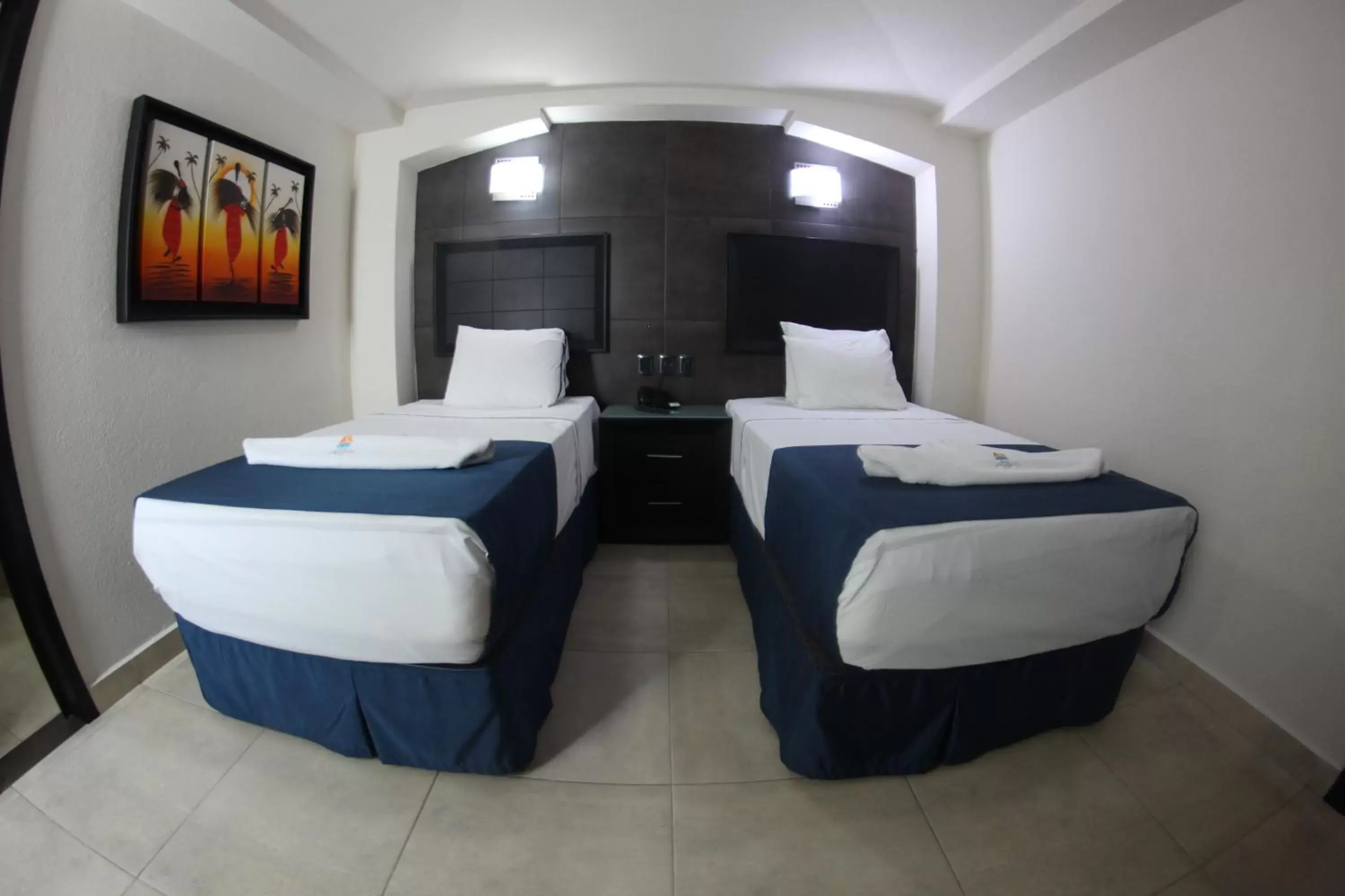 Photo of the whole room, Bed in Hotel Portonovo Plaza Malecon