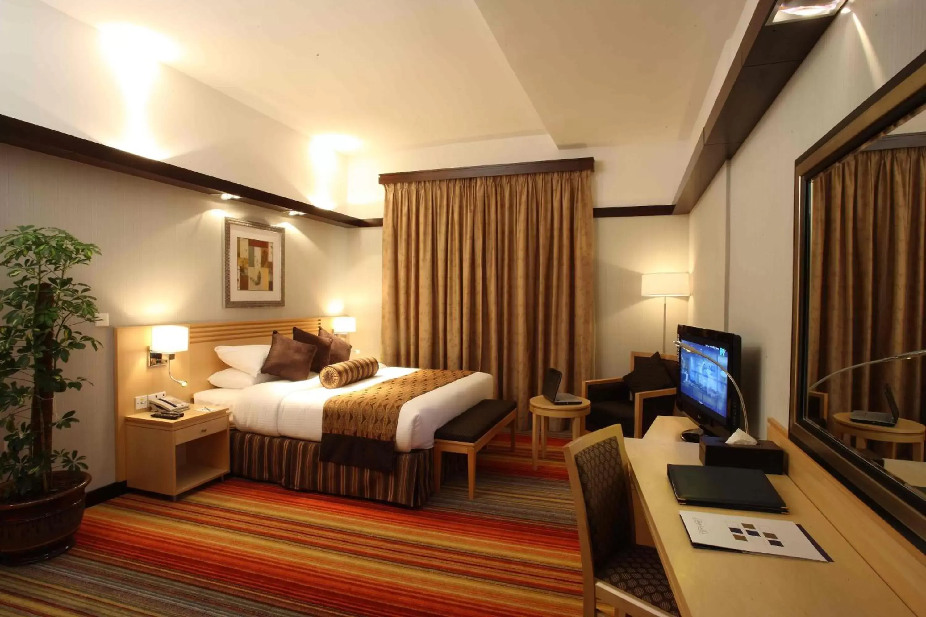 TV and multimedia, Bed in L'Arabia Hotel Apartments