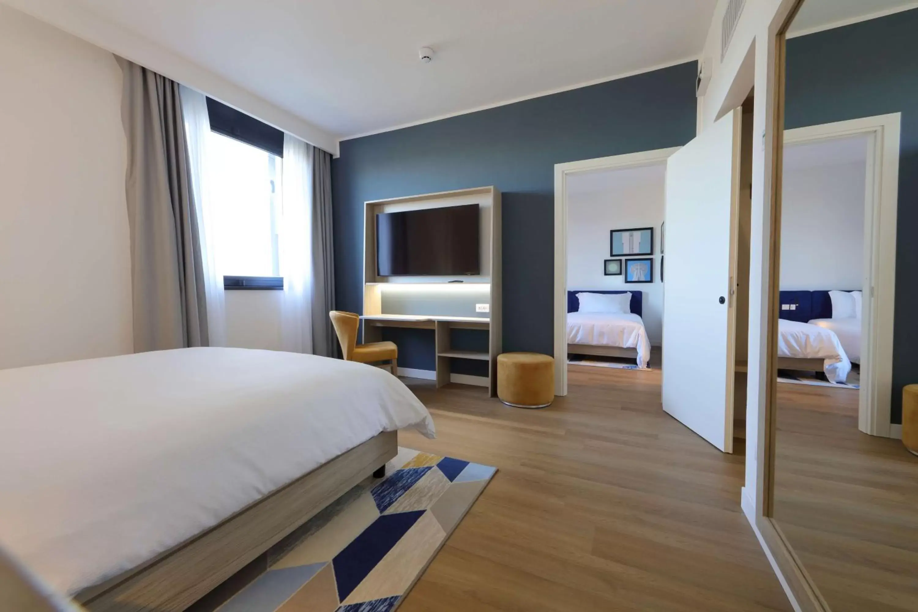 Bedroom, TV/Entertainment Center in Hampton by Hilton Rome North Fiano Romano