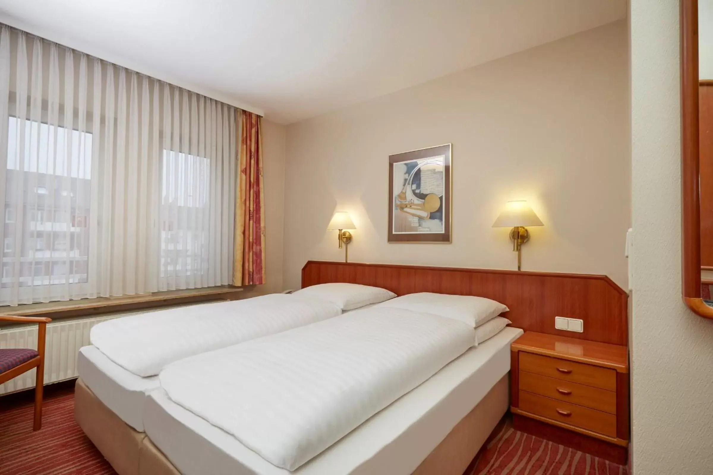 Photo of the whole room, Bed in Novum Hotel Mannheim City