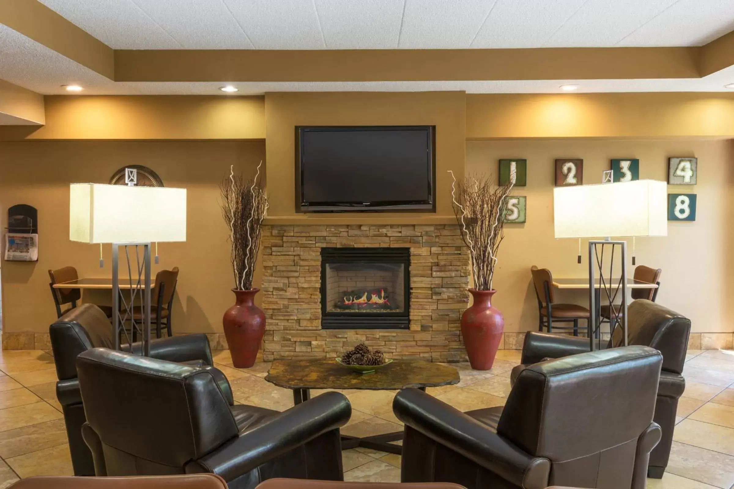 Lobby or reception, Seating Area in AmericInn by Wyndham Madison West