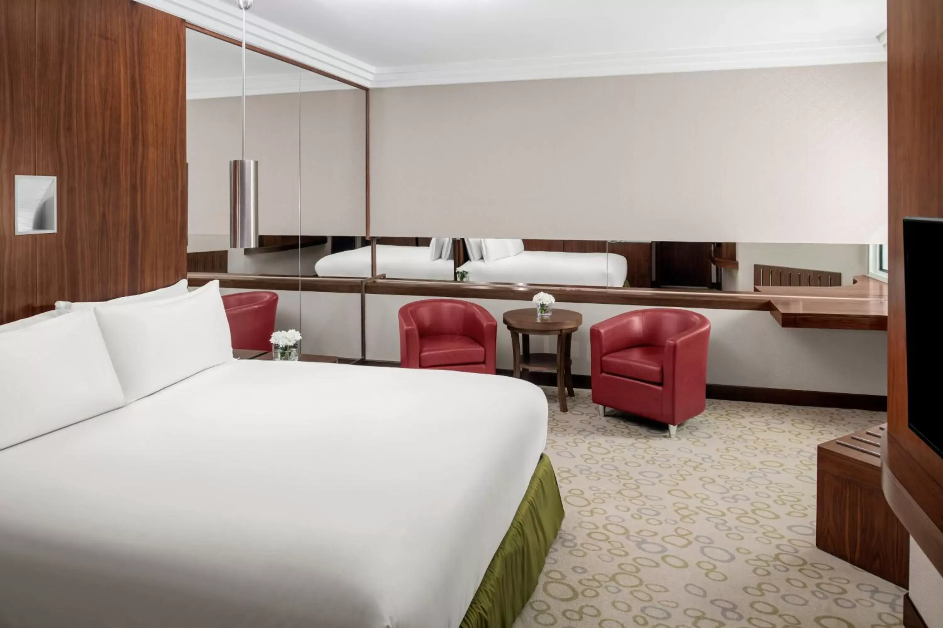 Bedroom, Bed in Crowne Plaza Hotel Riyadh Minhal, an IHG Hotel