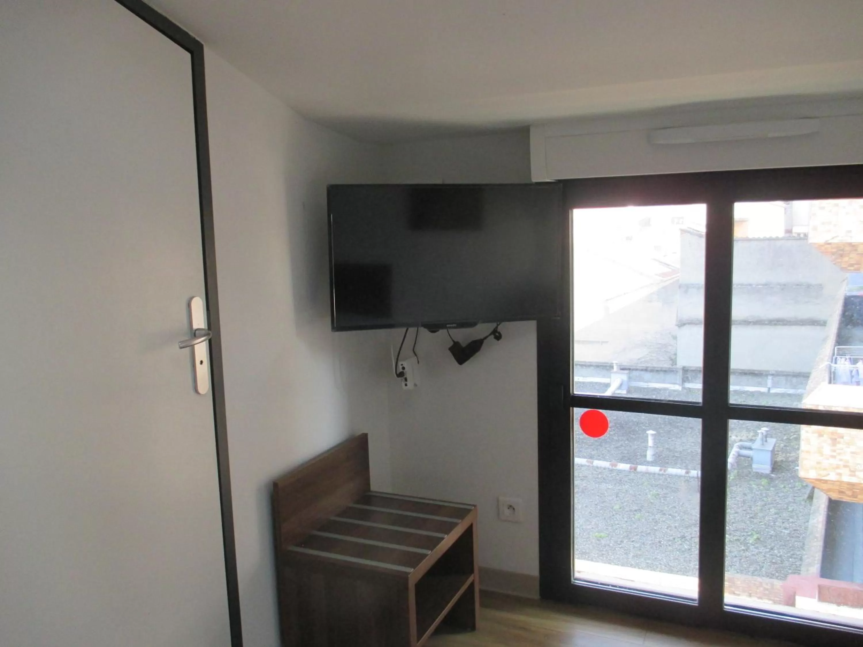 Bedroom in Hôtel le Pastel