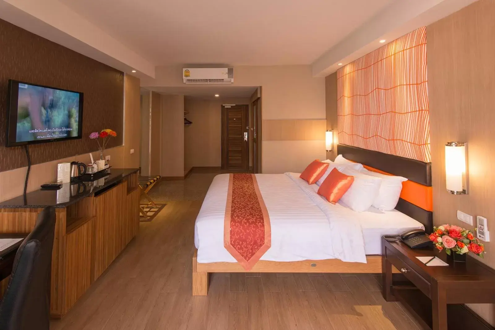 Bed in Dynasty Grande Hotel