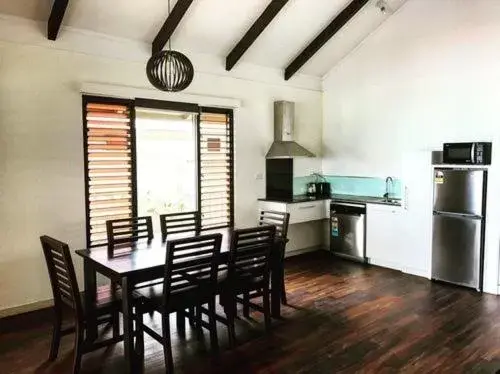Kitchen or kitchenette, Dining Area in First Landing Beach Resort & Villas