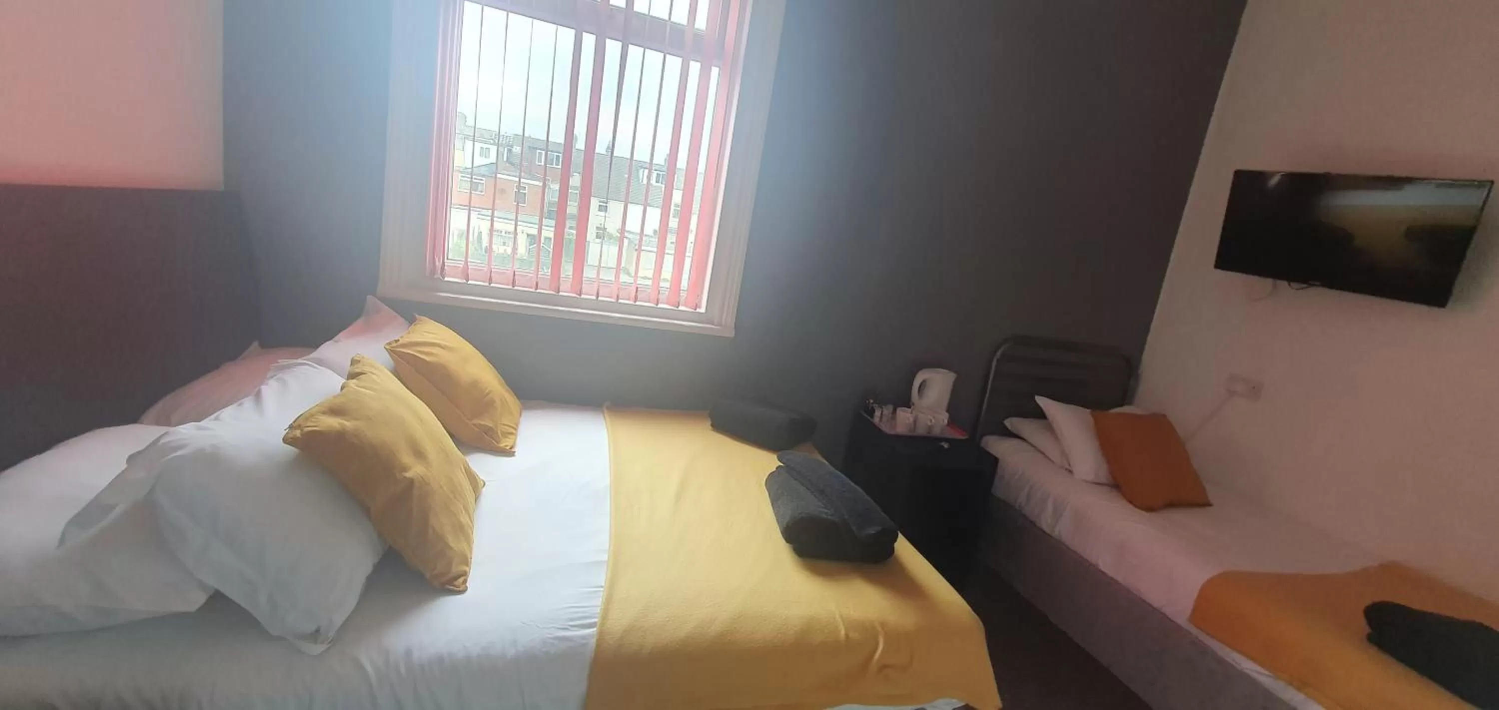 Bed in Palm Beach Hotel by the Sea