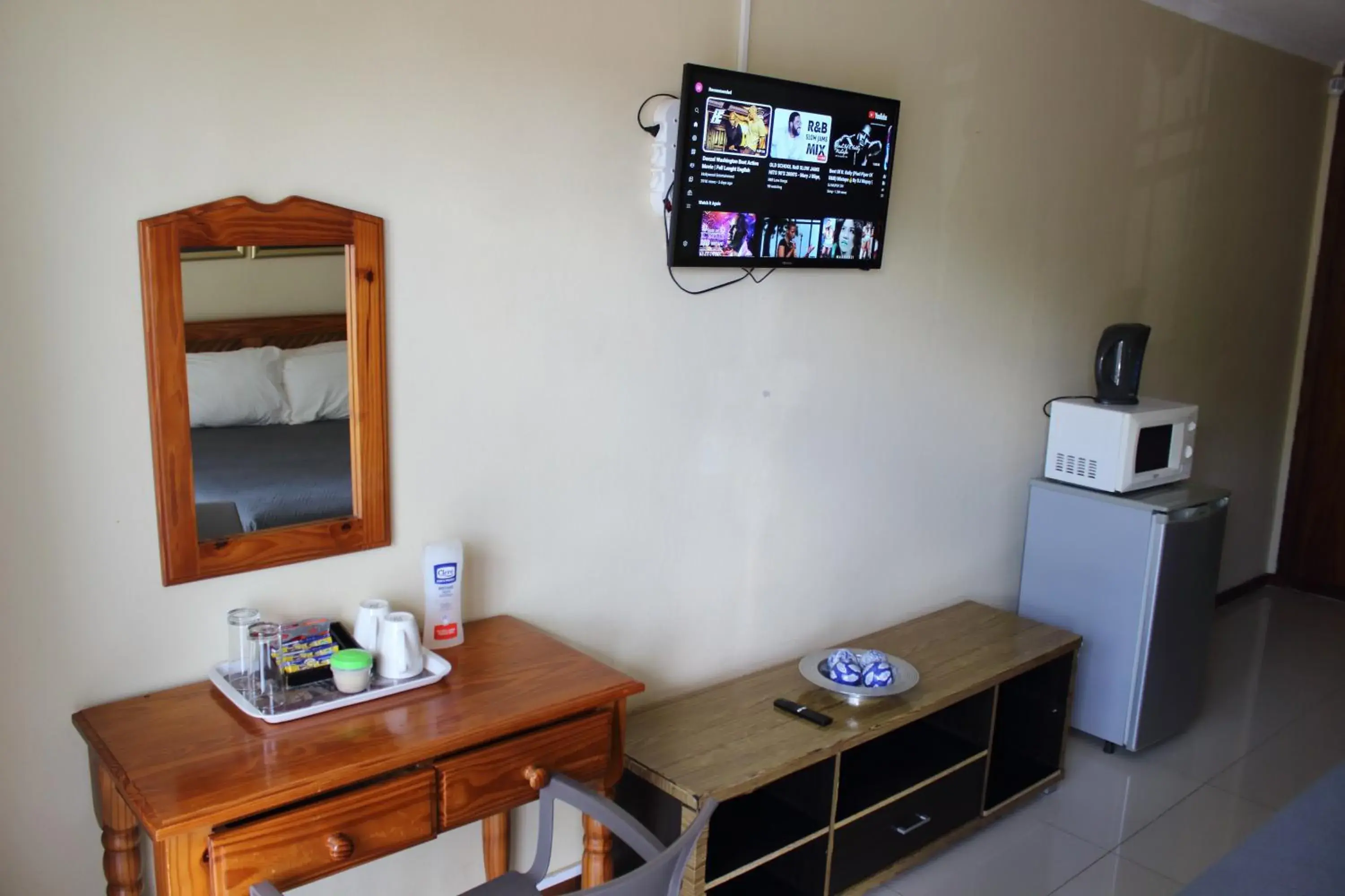 TV and multimedia, TV/Entertainment Center in Purple Olive Guest House