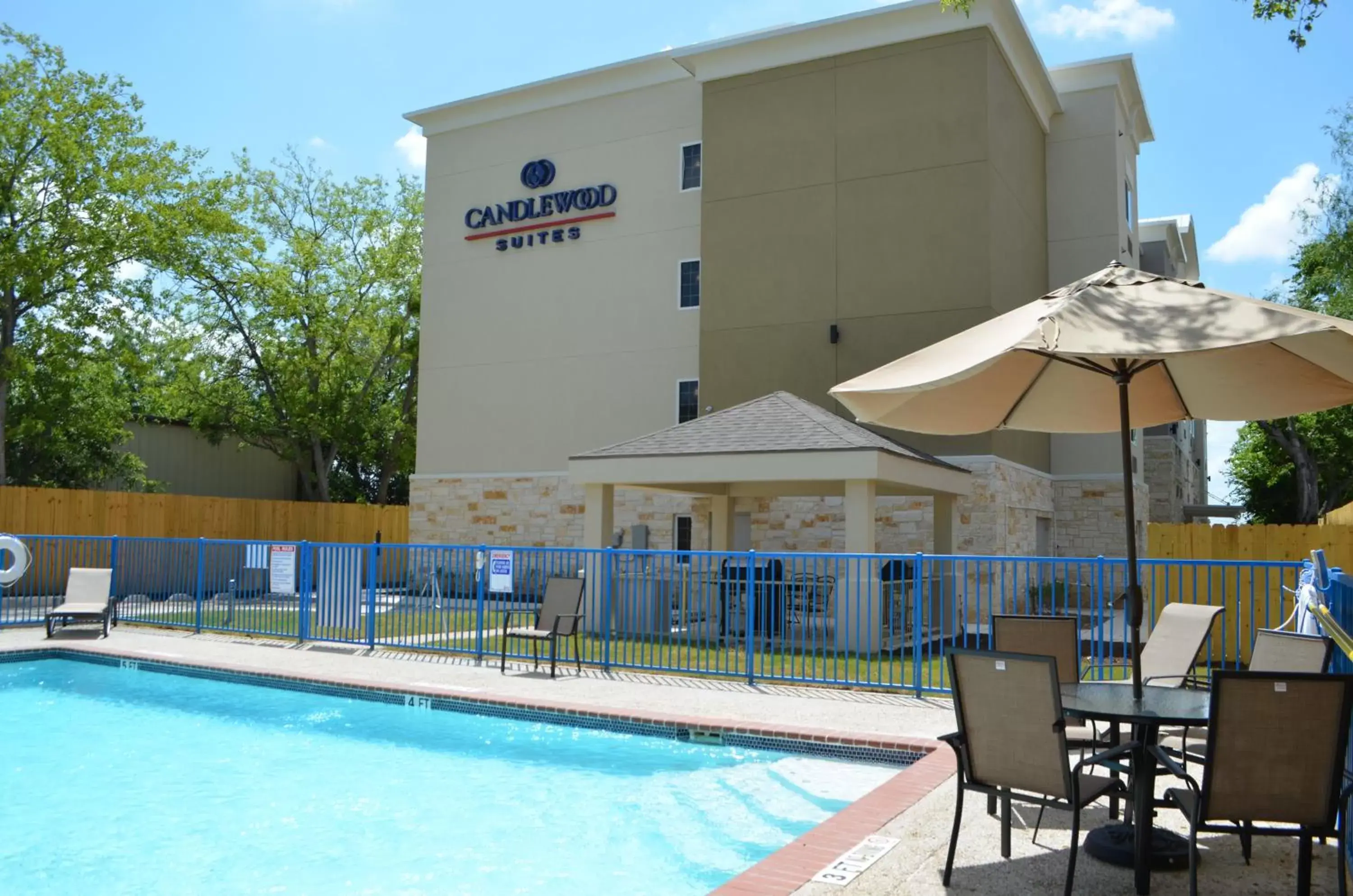 Swimming pool, Property Building in Candlewood Suites San Antonio Airport, an IHG Hotel