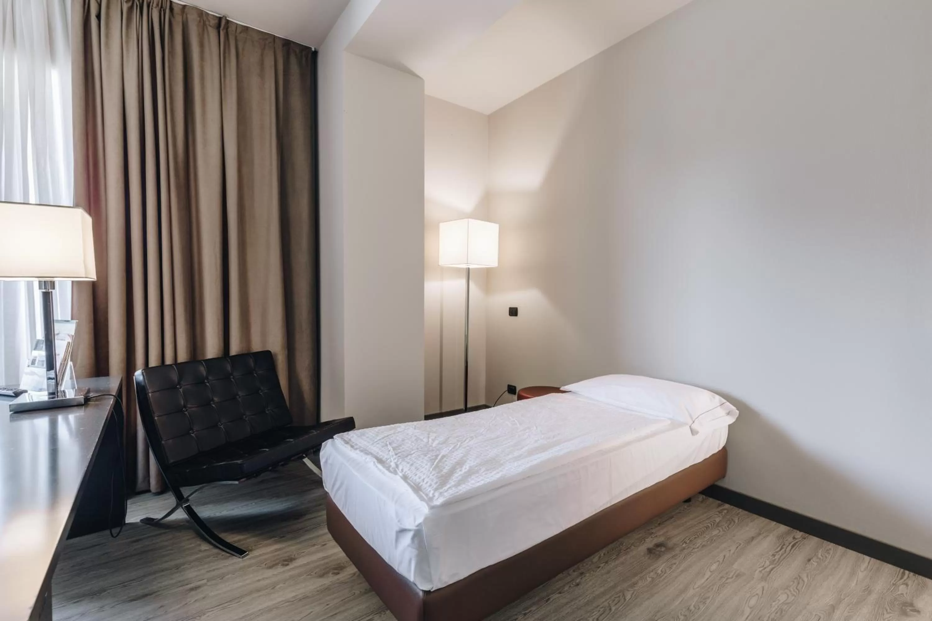 Bed in Hotel Continental