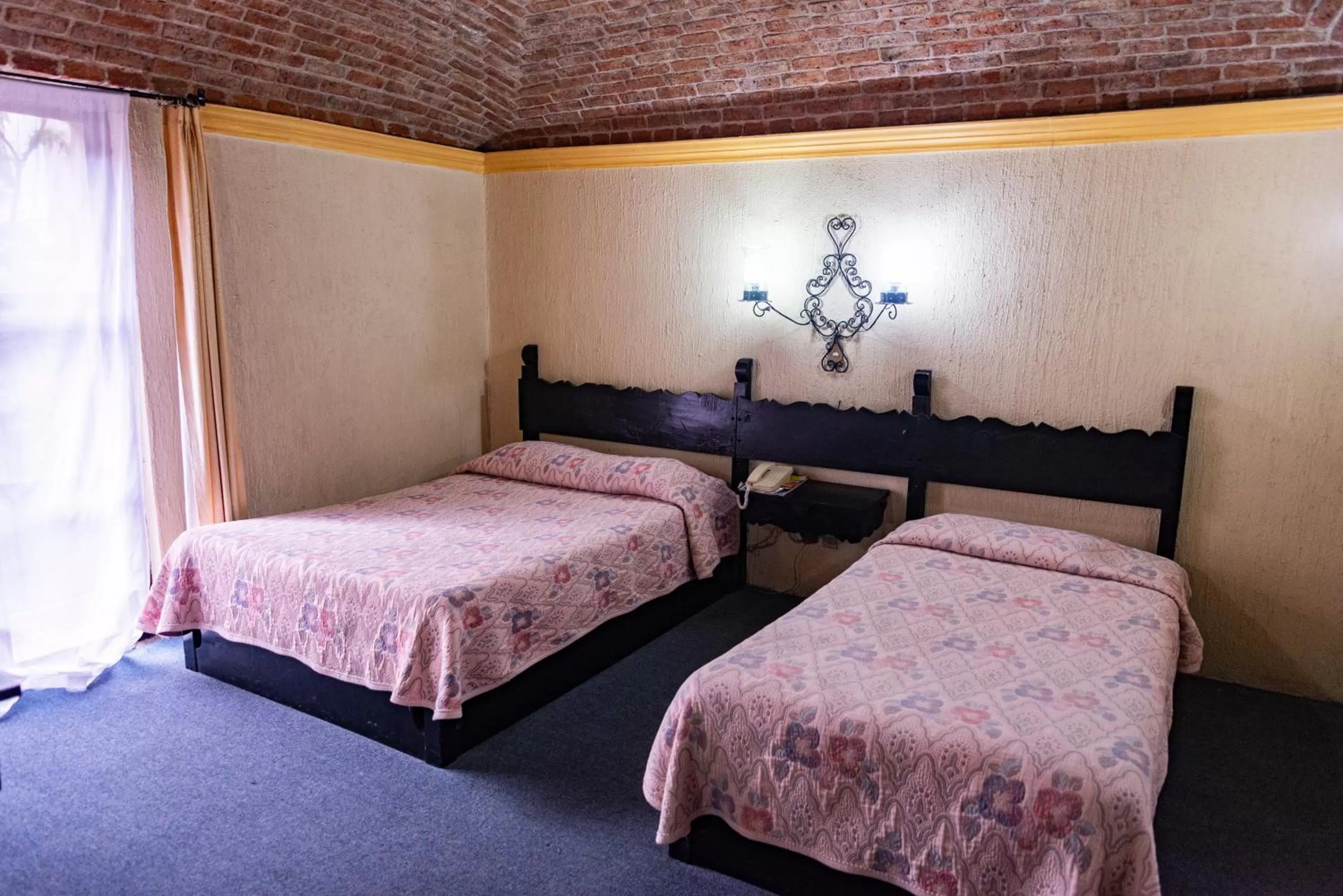 Bed in Hotel Hacienda de Cobos