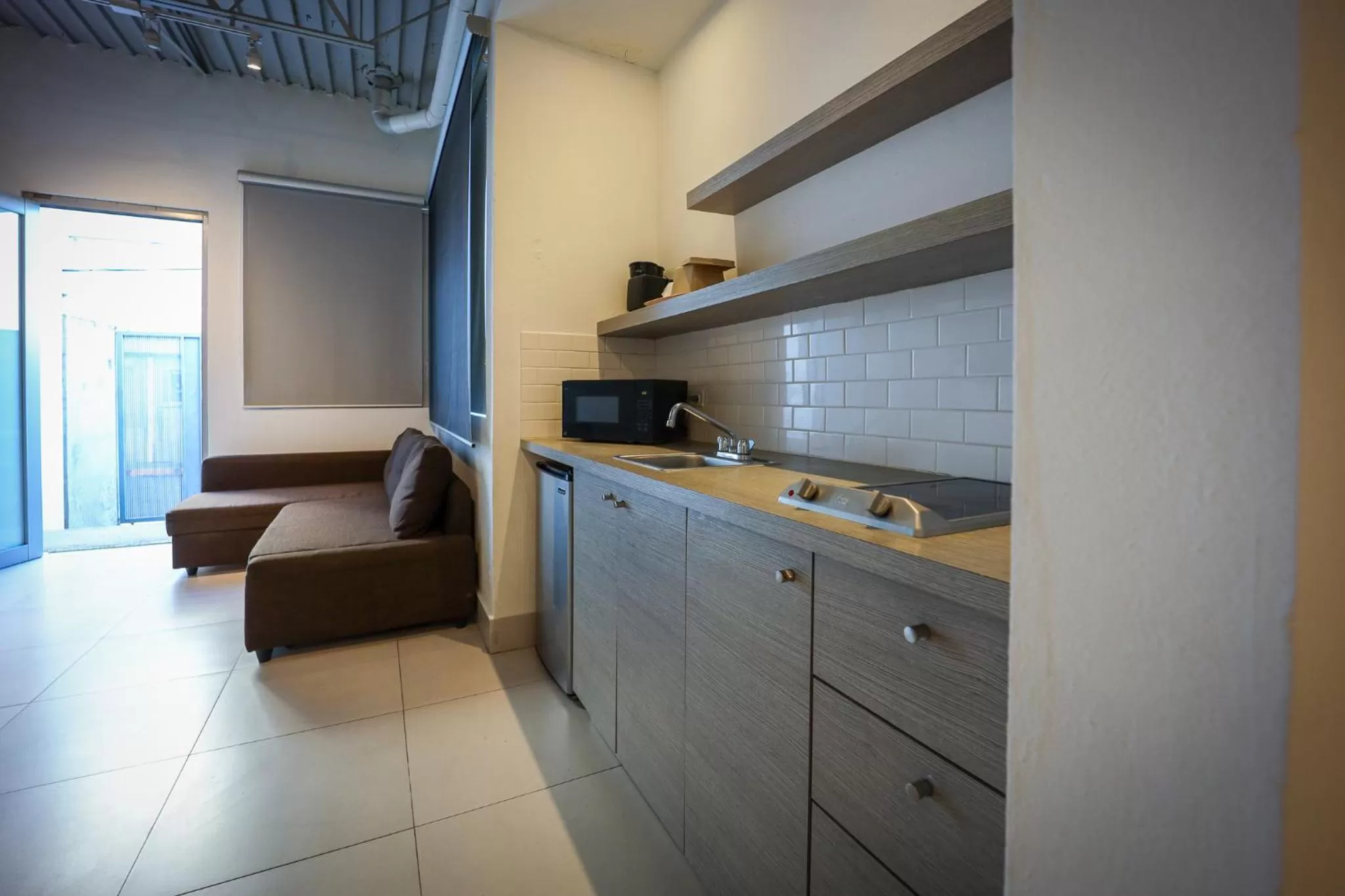 Kitchen/Kitchenette in Coral Suites