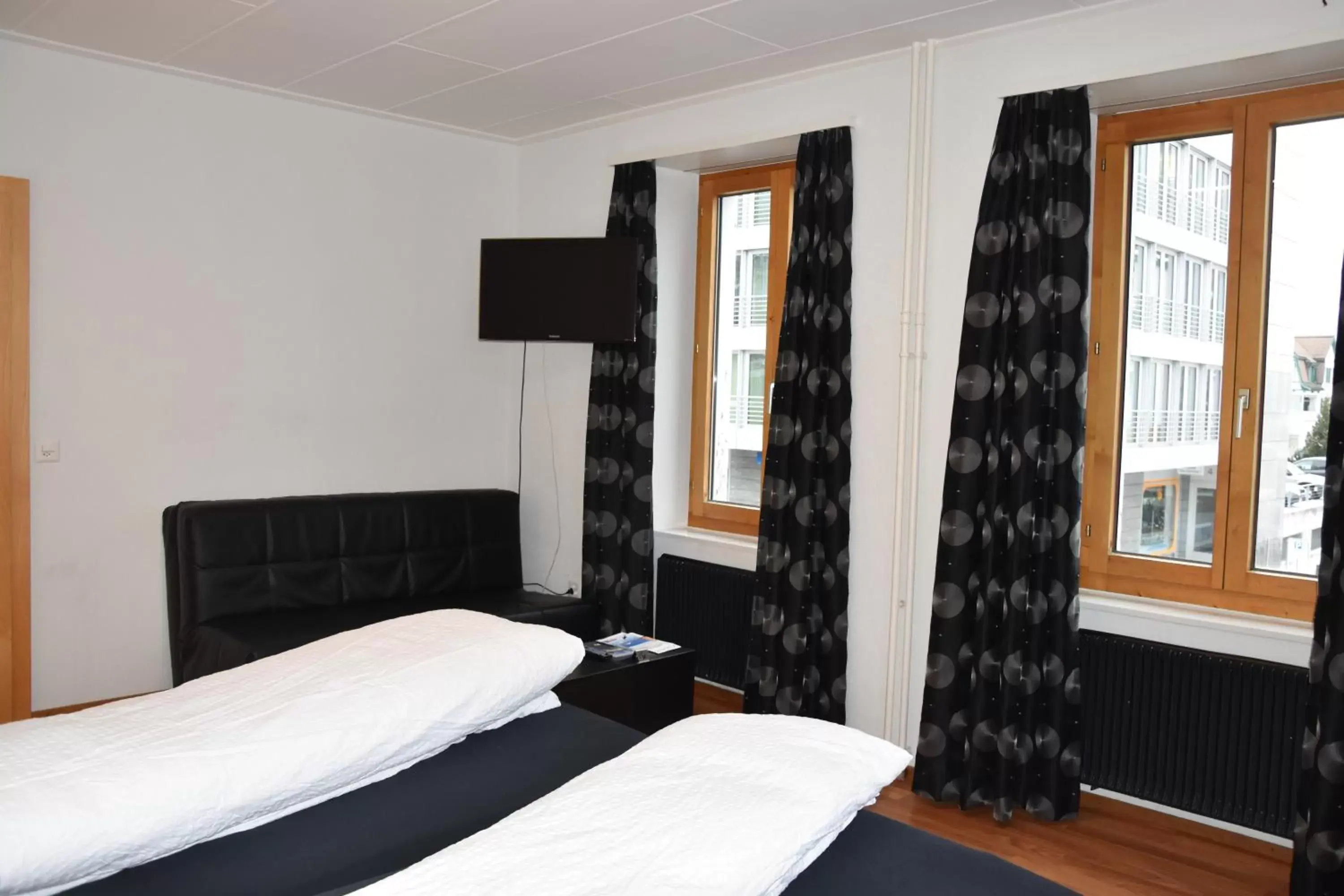 Photo of the whole room, Bed in Hotel Rätia