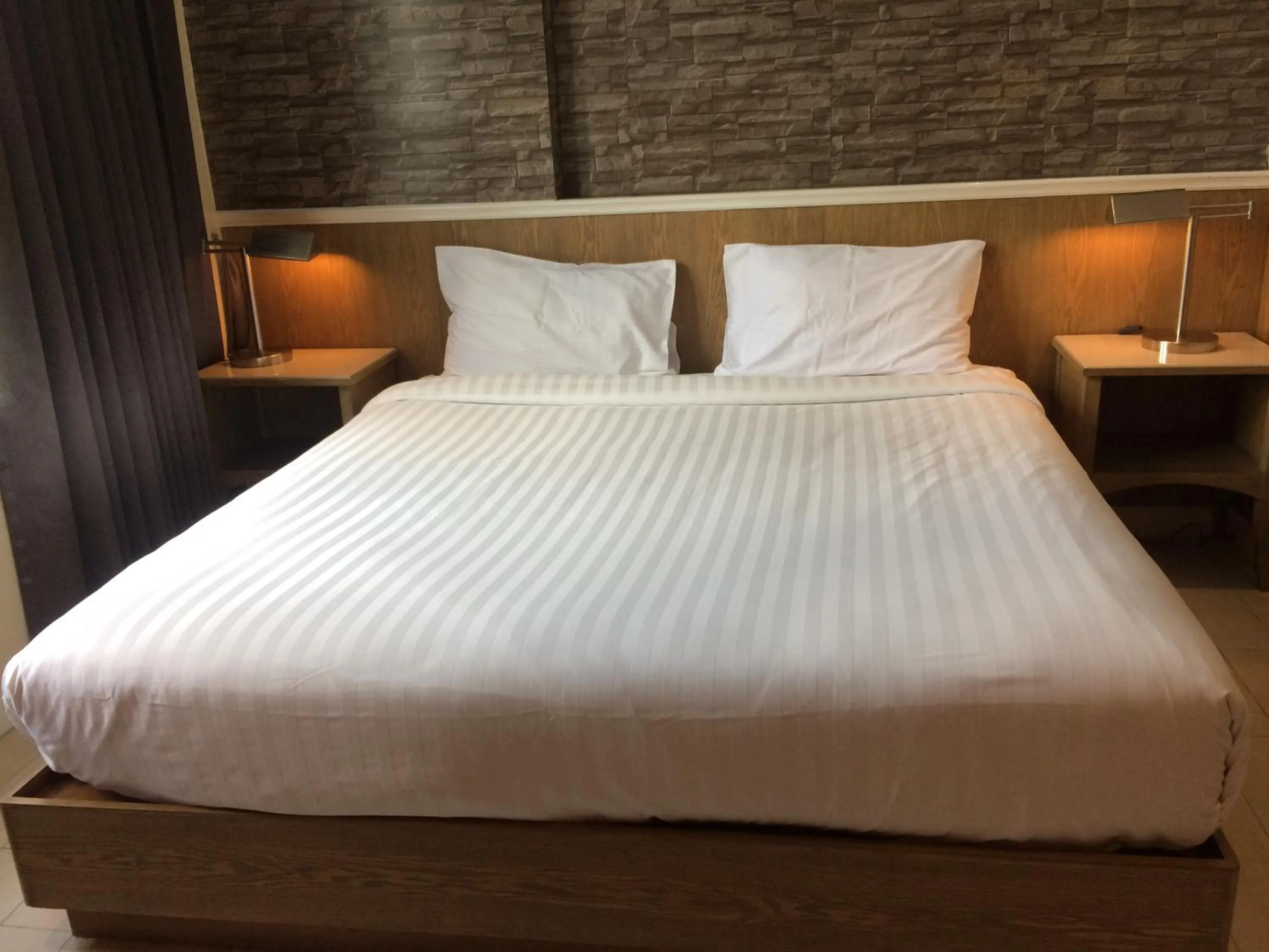 Bed in Bourbon St. Boutique Hotel