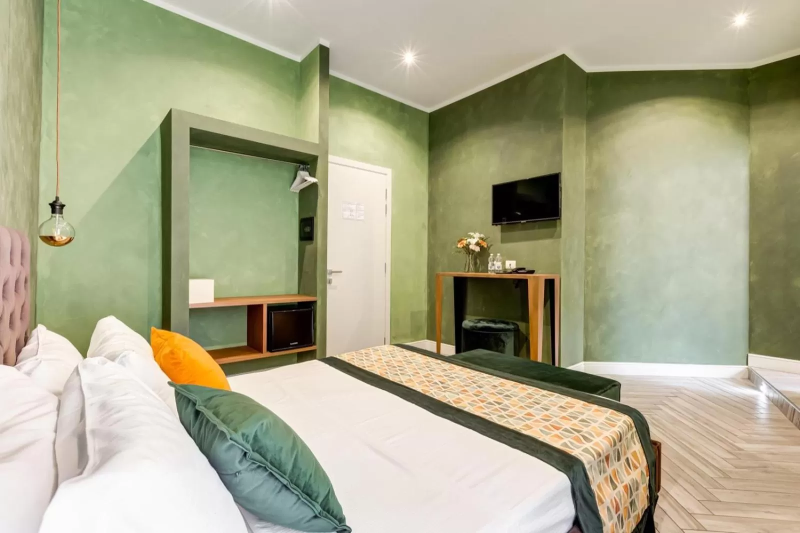 Bed in Ripetta Deluxe Suites