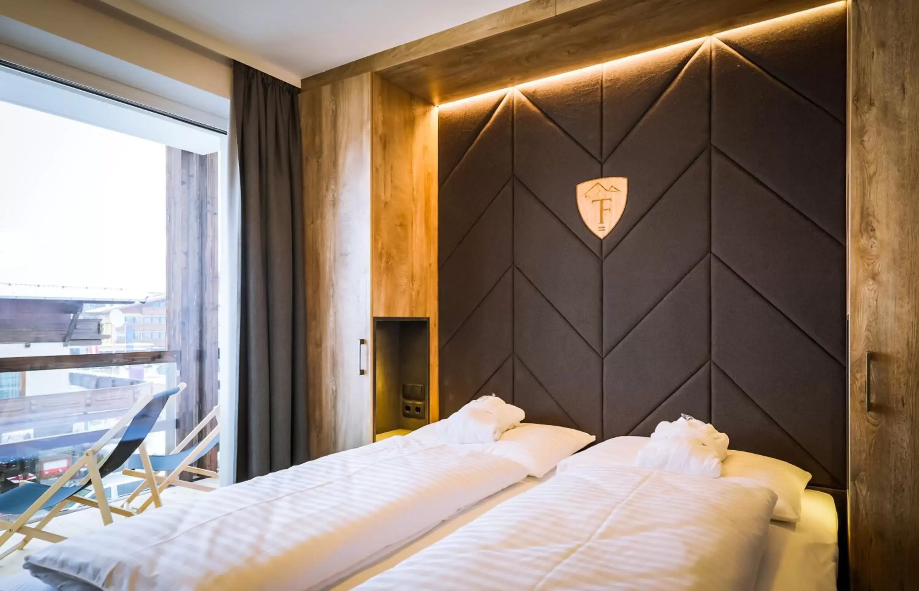 Bedroom, Bed in 24 by AvenidA Hotel & Residences Kaprun