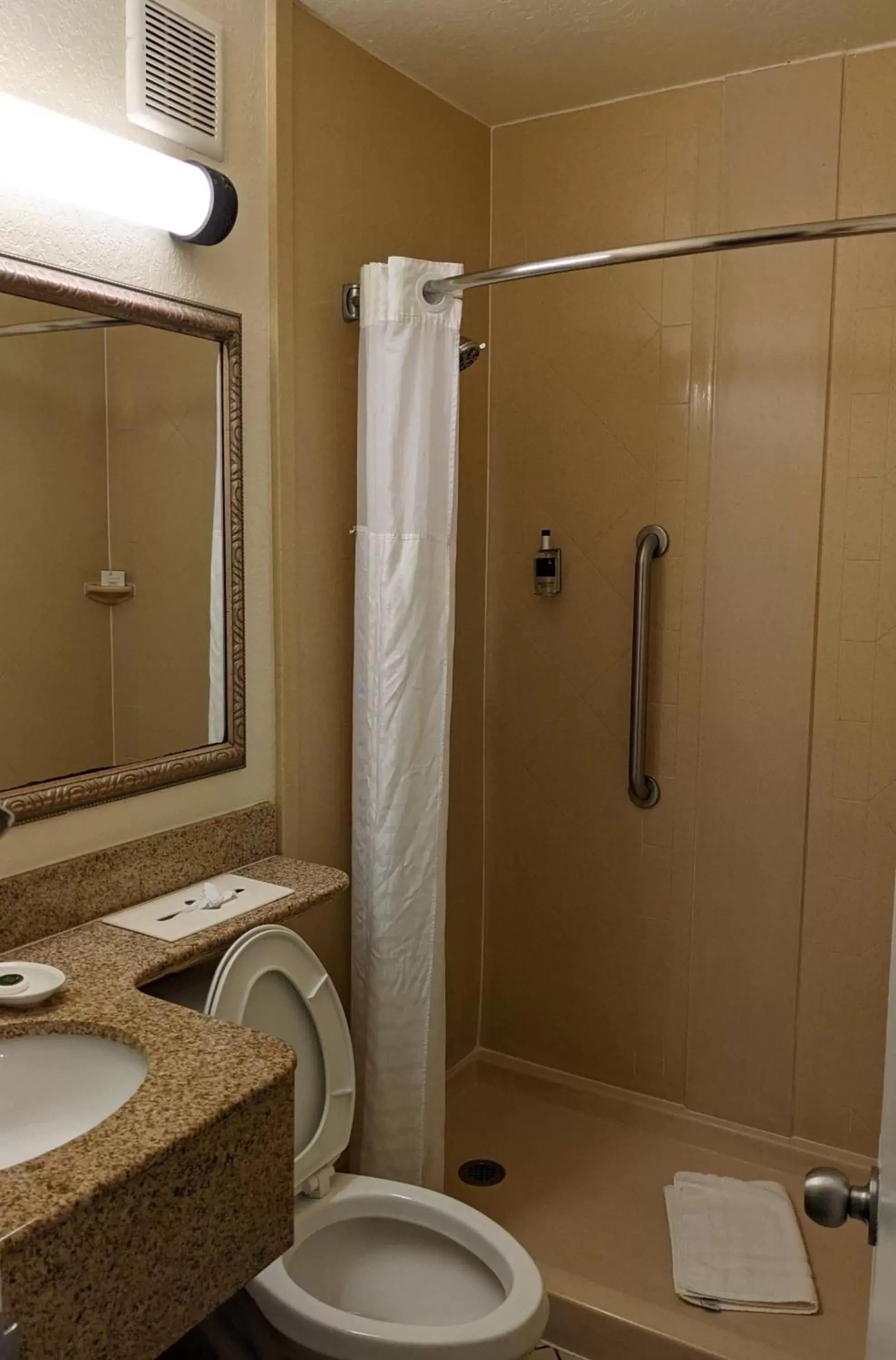 Bathroom in Beachside Hotel and Suites