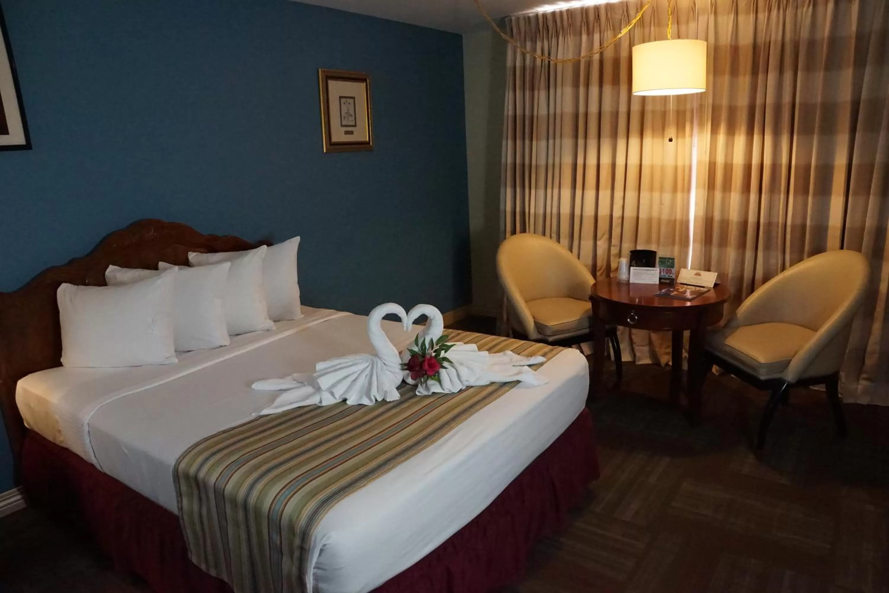 Bed in Railroad Pass Hotel and Casino Ramada by Wyndham