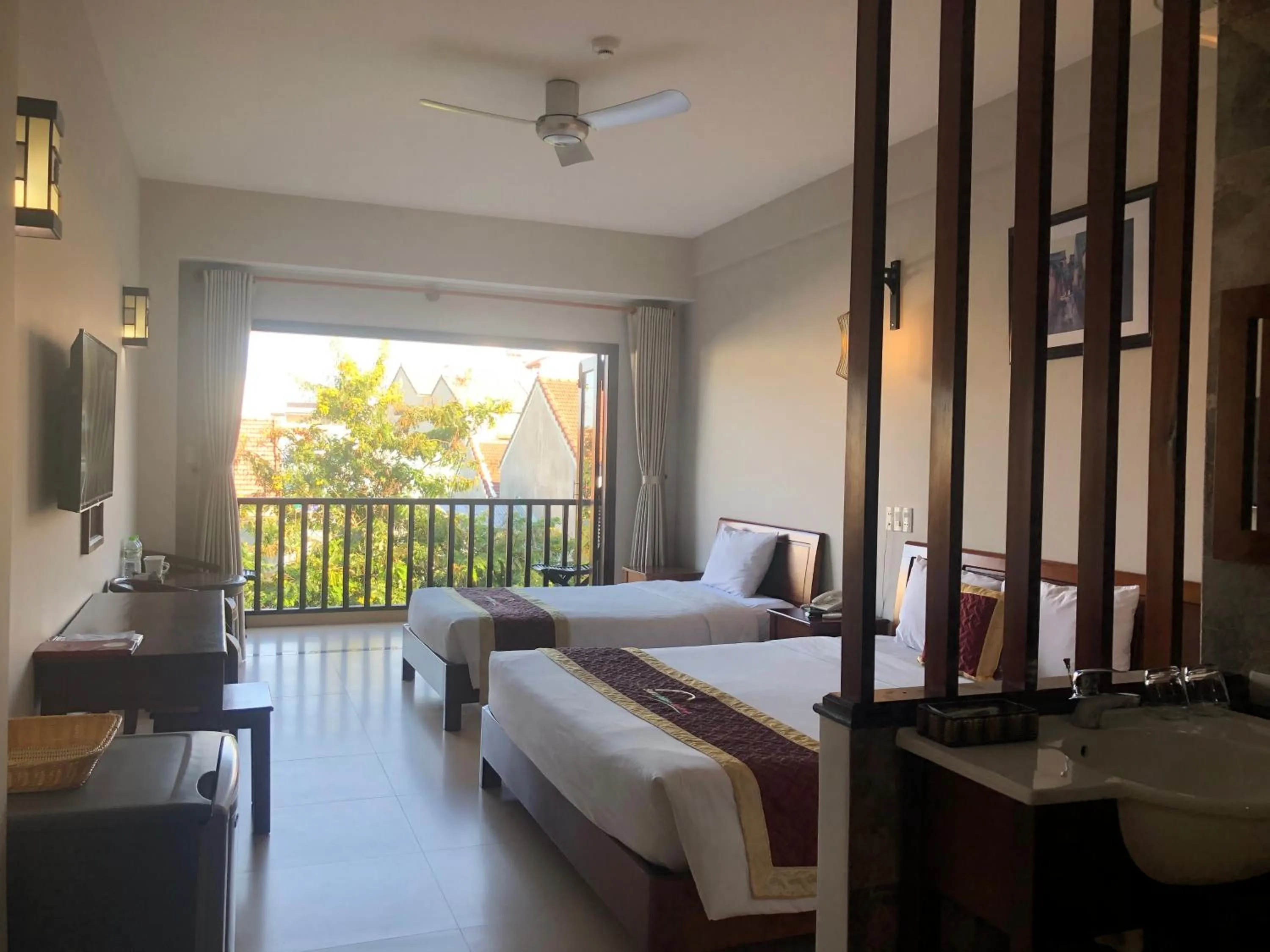 Bed in Sunshine Hoian Hotel