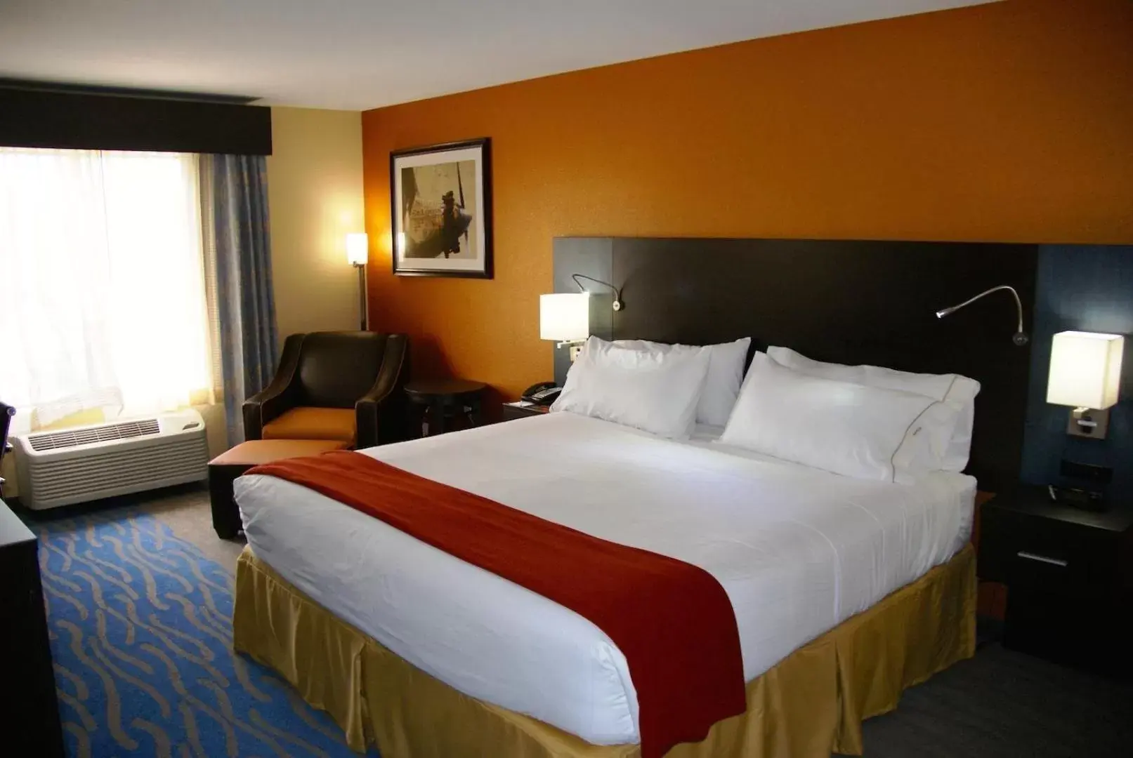 Bed in Holiday Inn Express & Suites St Louis Airport, an IHG Hotel