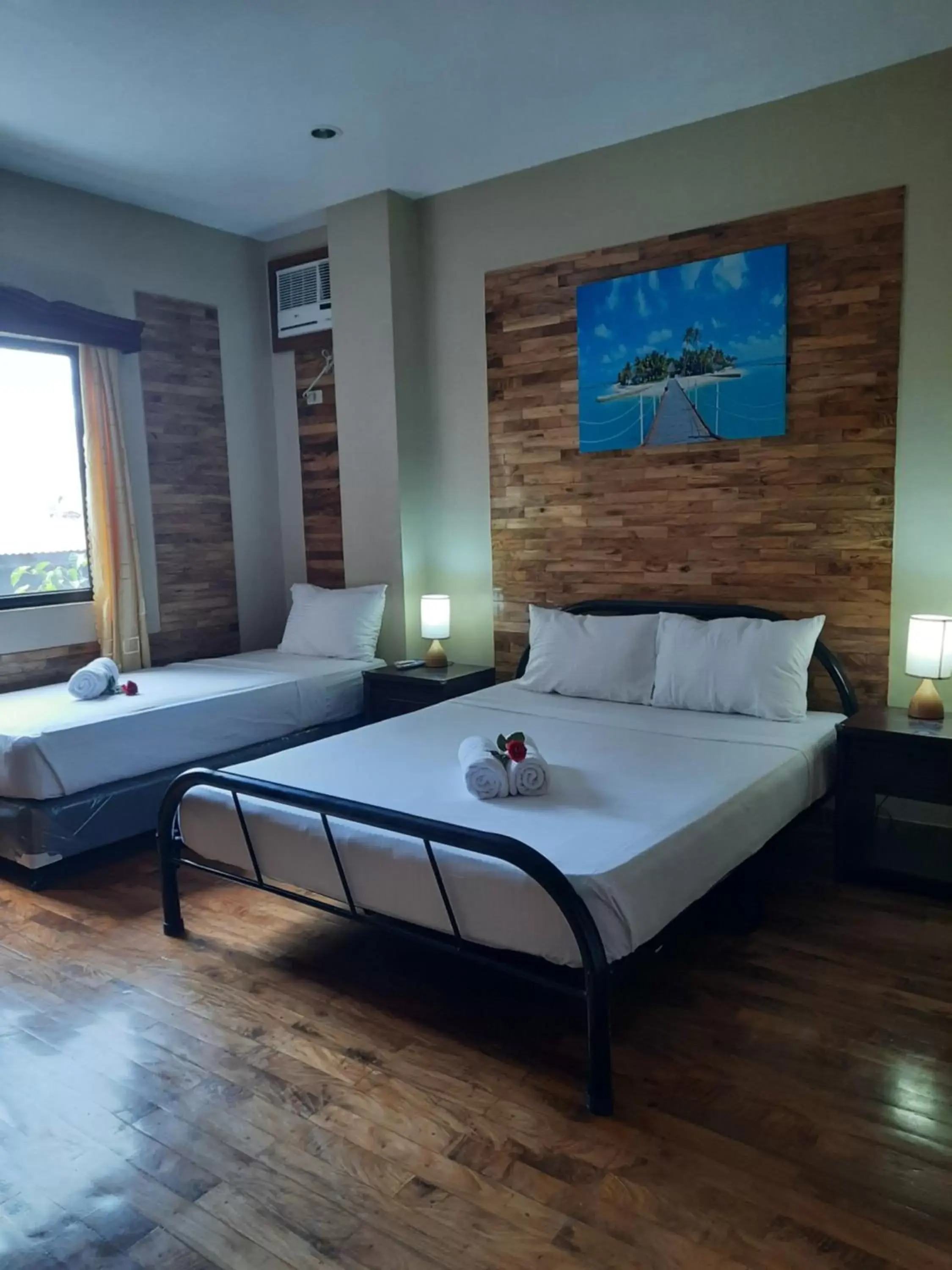 Bed in Mabini Hotel Bed in Mabini Hotel