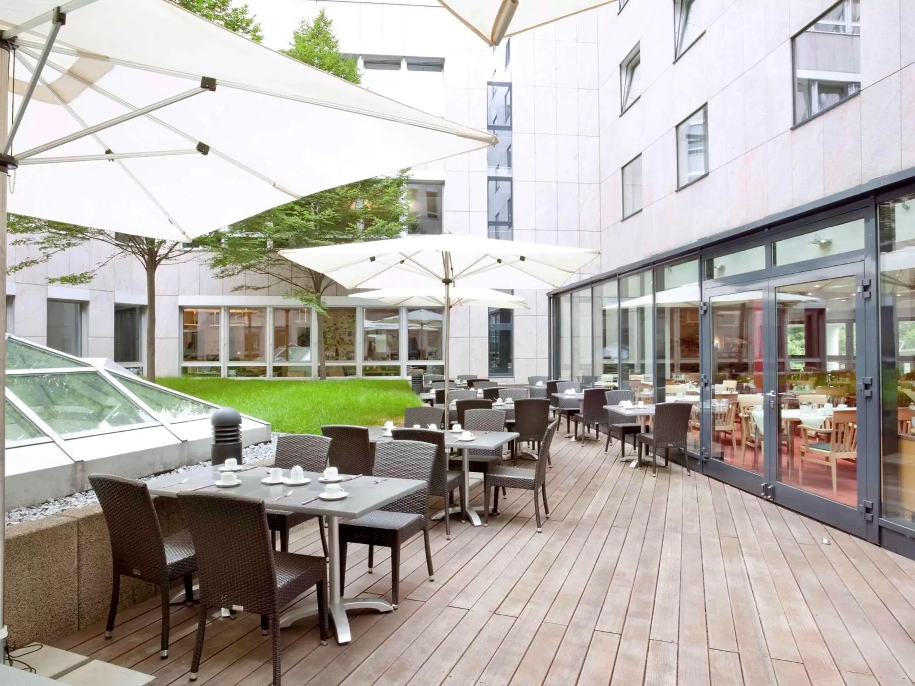 Balcony/Terrace, Restaurant/Places to Eat in voco Dusseldorf Seestern, an IHG Hotel