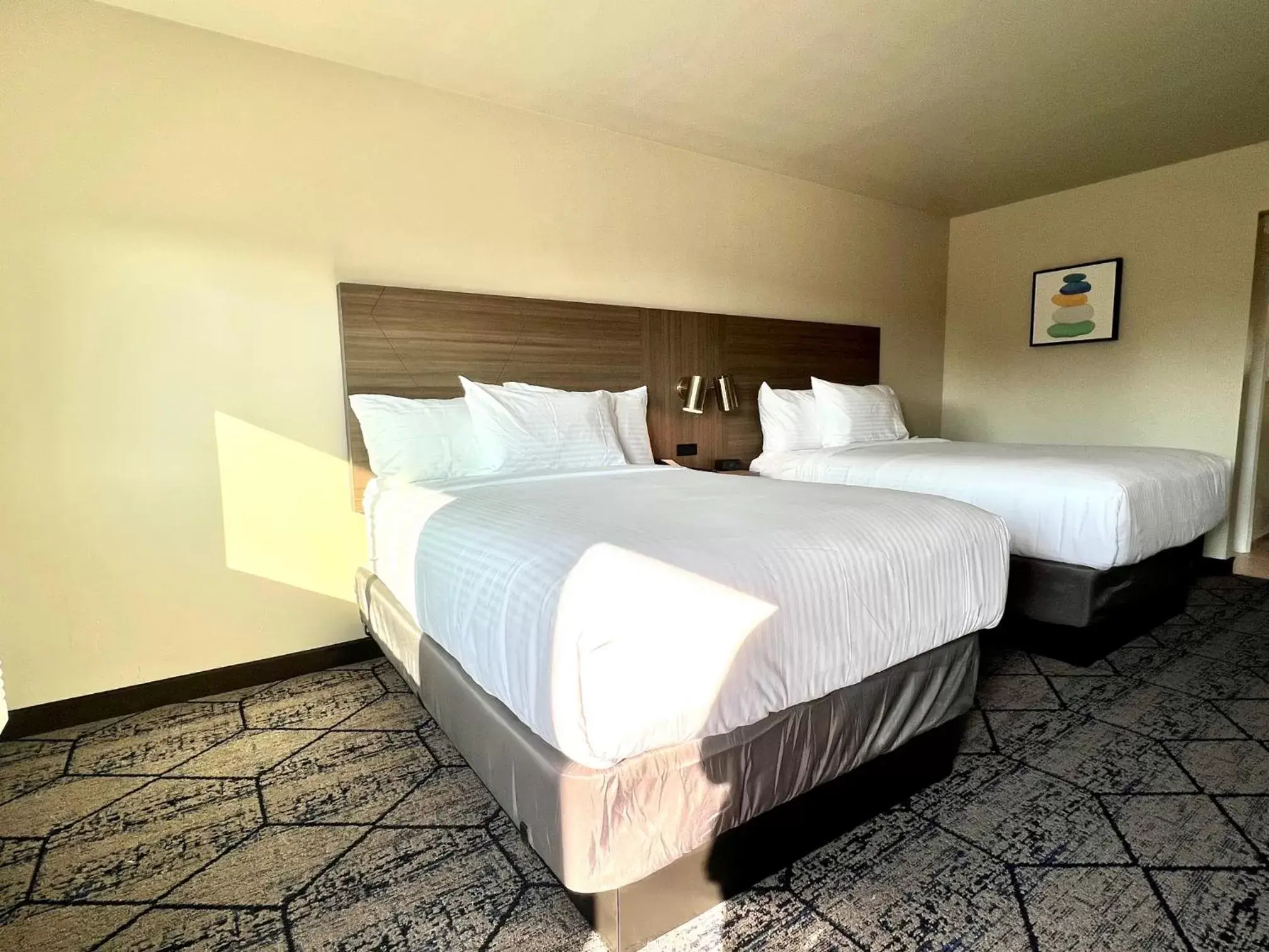 Bed in Ramada by Wyndham Modesto Yosemite Area