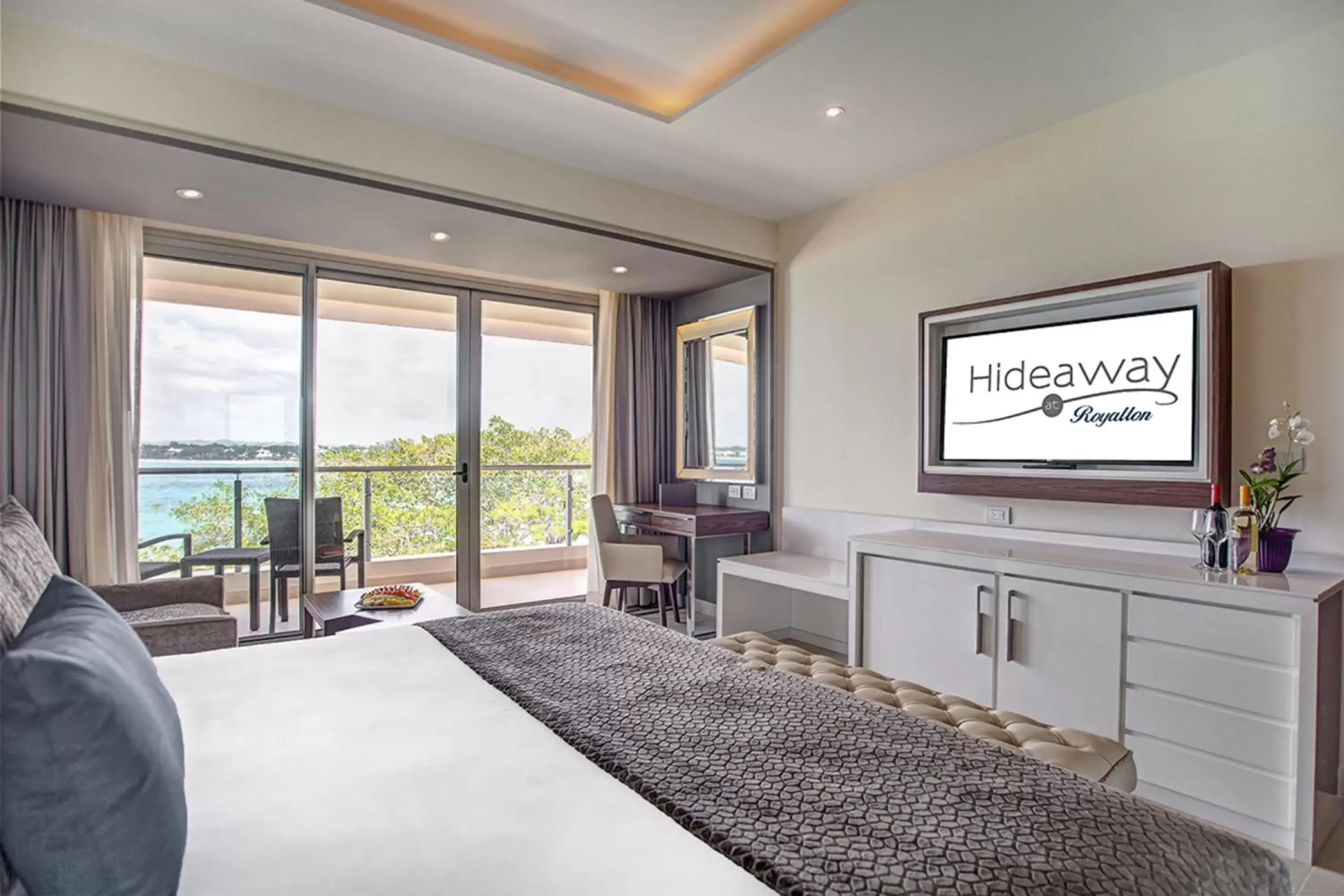 Photo of the whole room, TV/Entertainment Center in Hideaway at Royalton Negril, An Autograph Collection All-Inclusive Resort - Adults Only