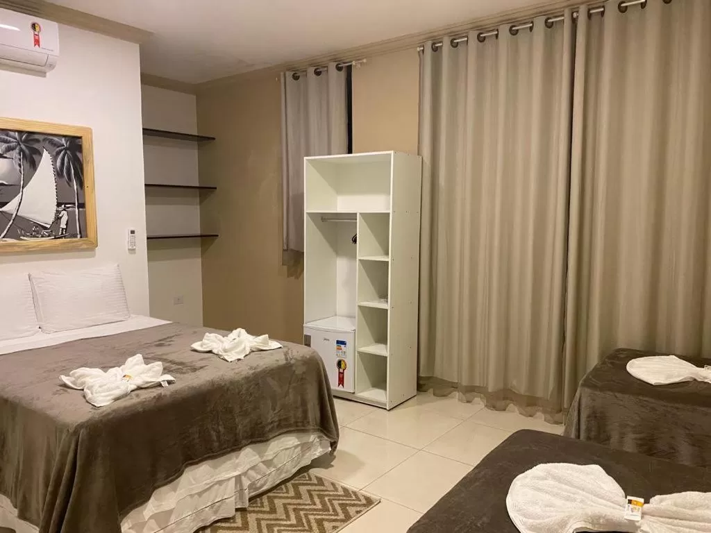 Bed in Pousada La Belle