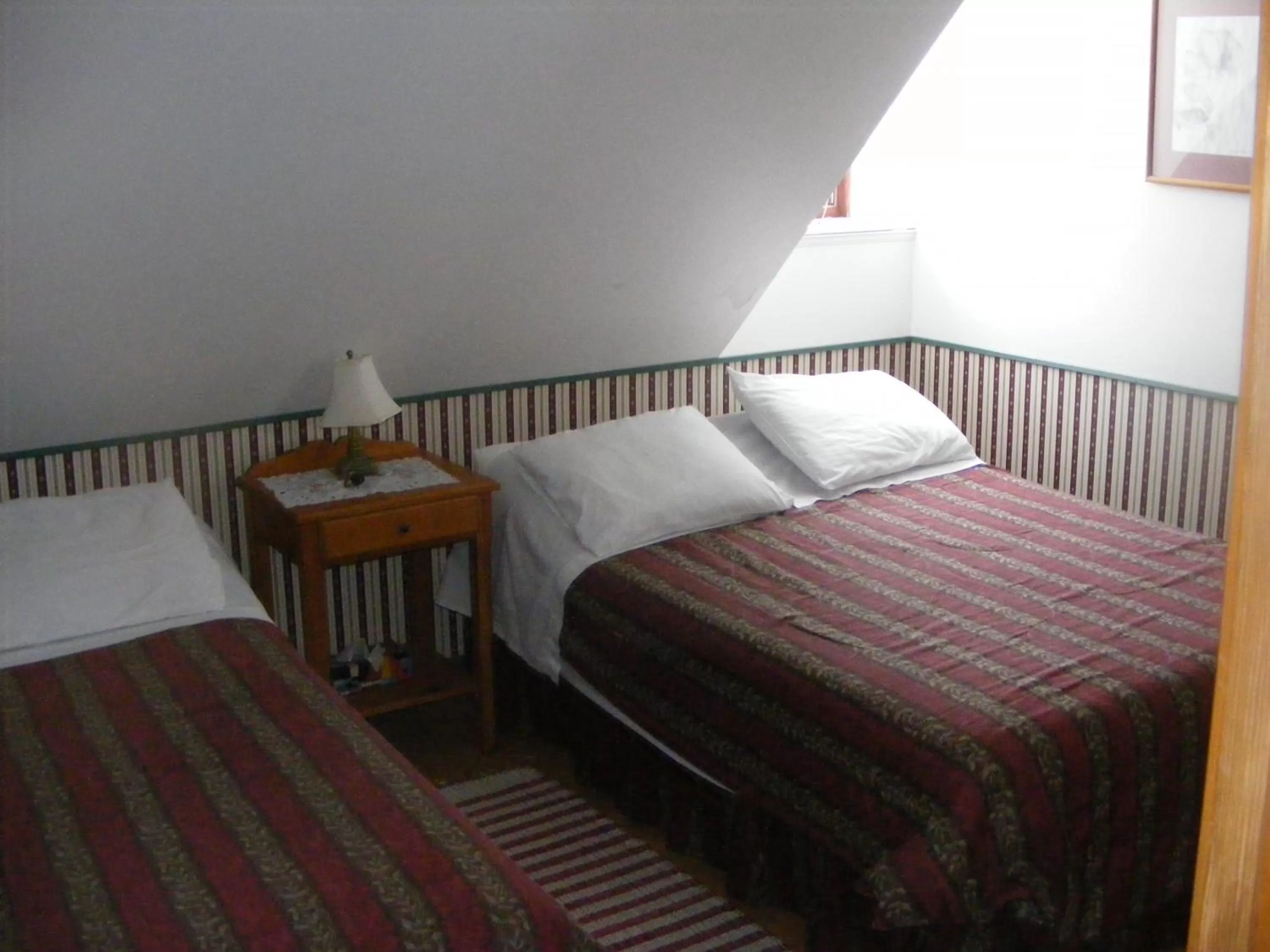 Bed in Auberge La Seigneurie Valcartier