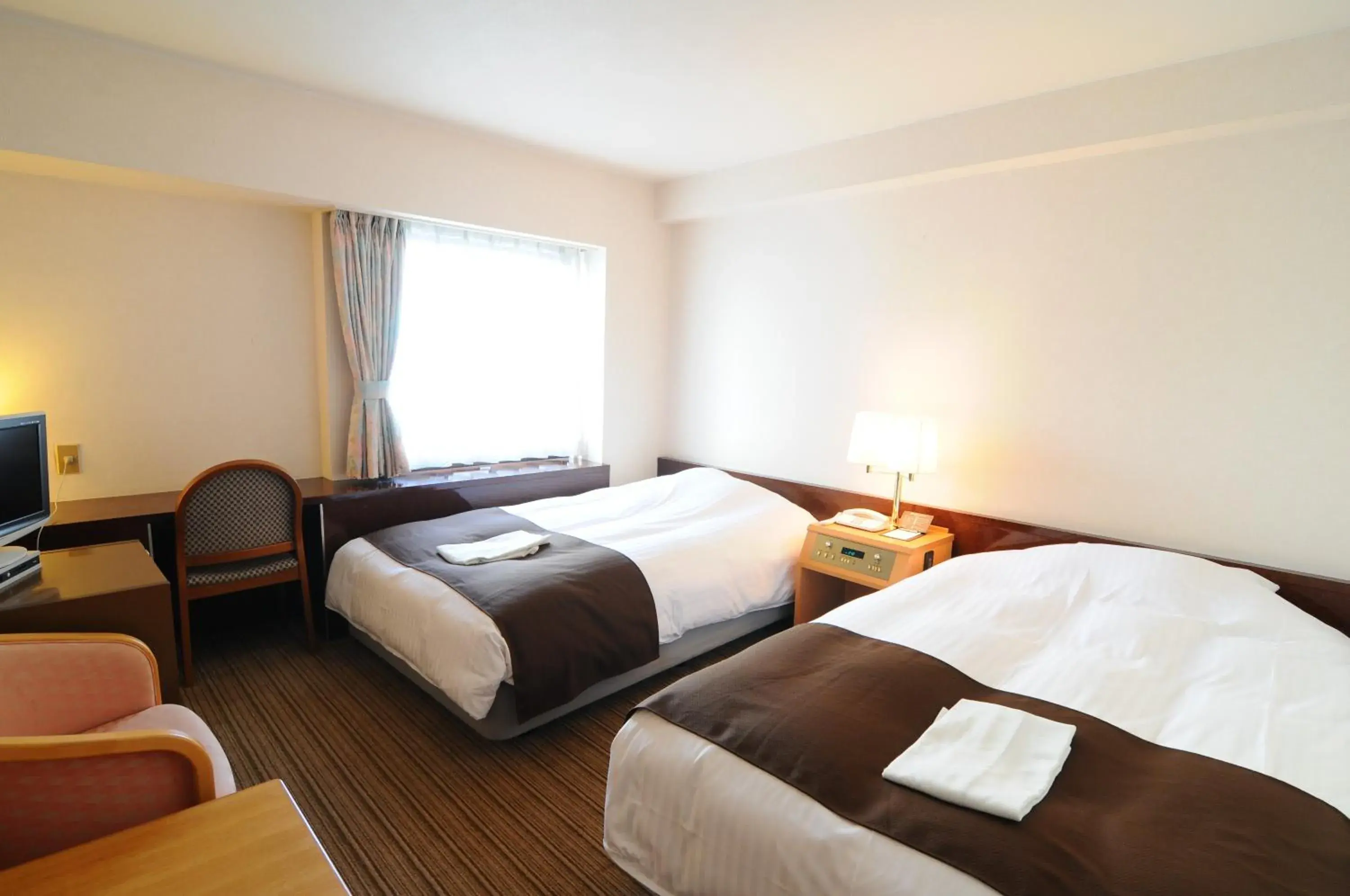 Bed in Niigata Toei Hotel