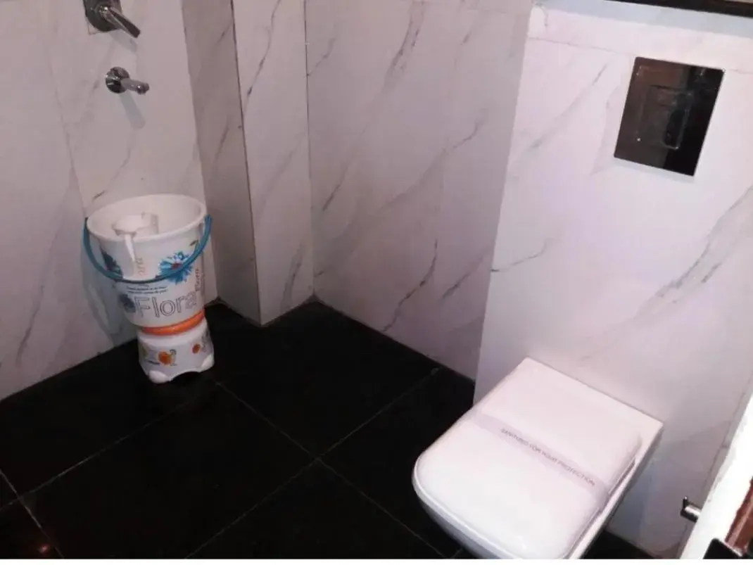 Toilet, Bathroom in Hotel Ambience