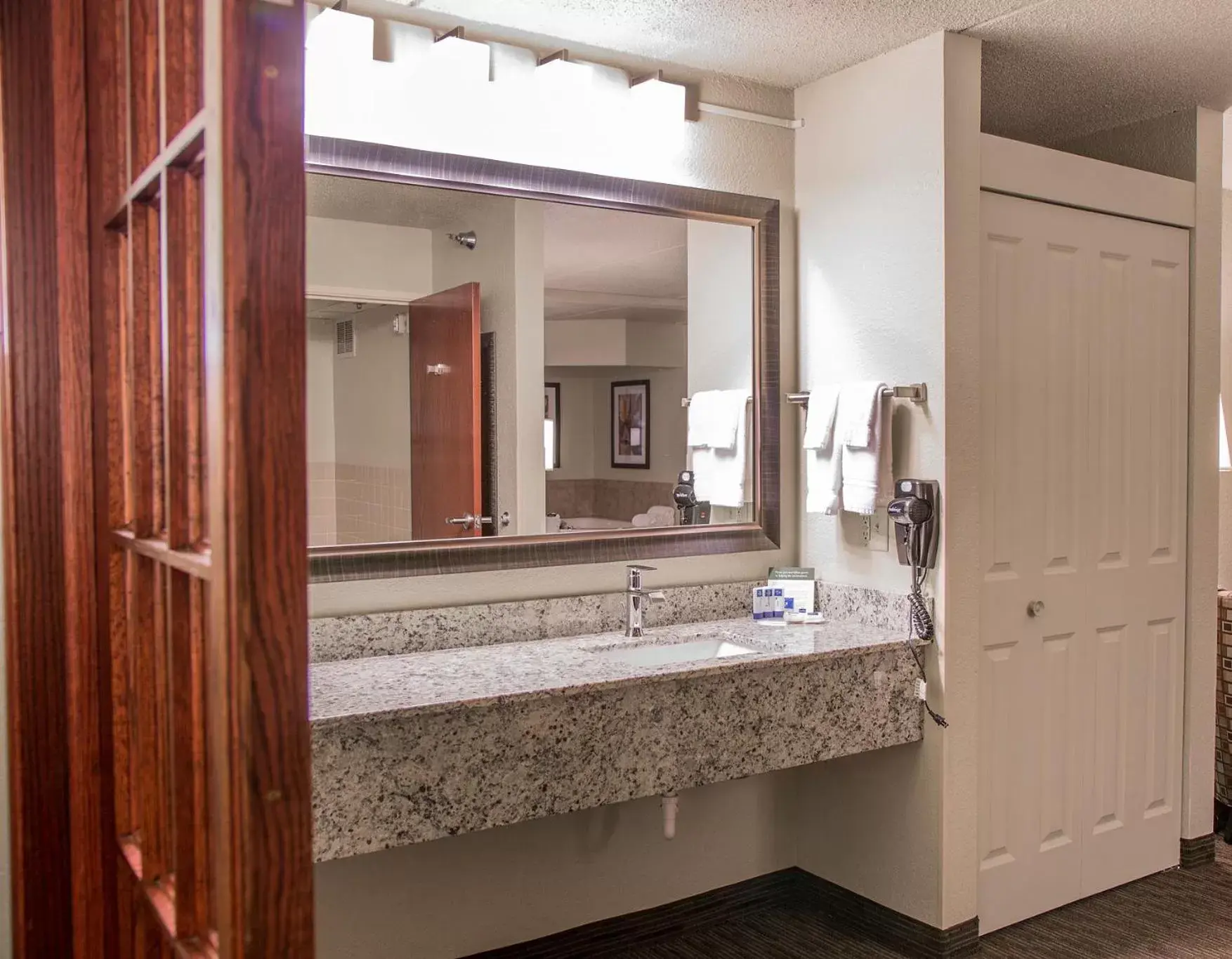 Bathroom in AmericInn by Wyndham Mounds View Minneapolis