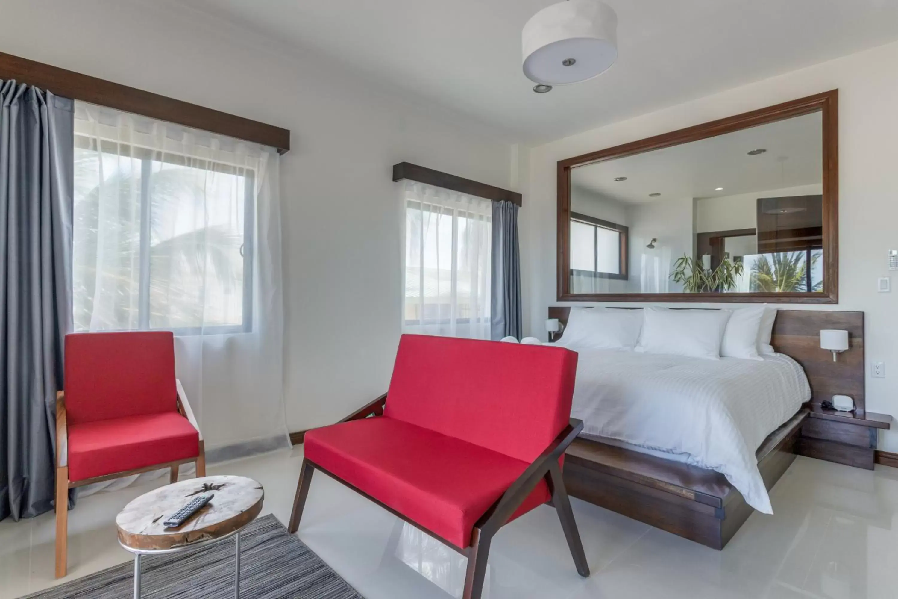 Bedroom, Seating Area in The Ellysian Boutique Hotel