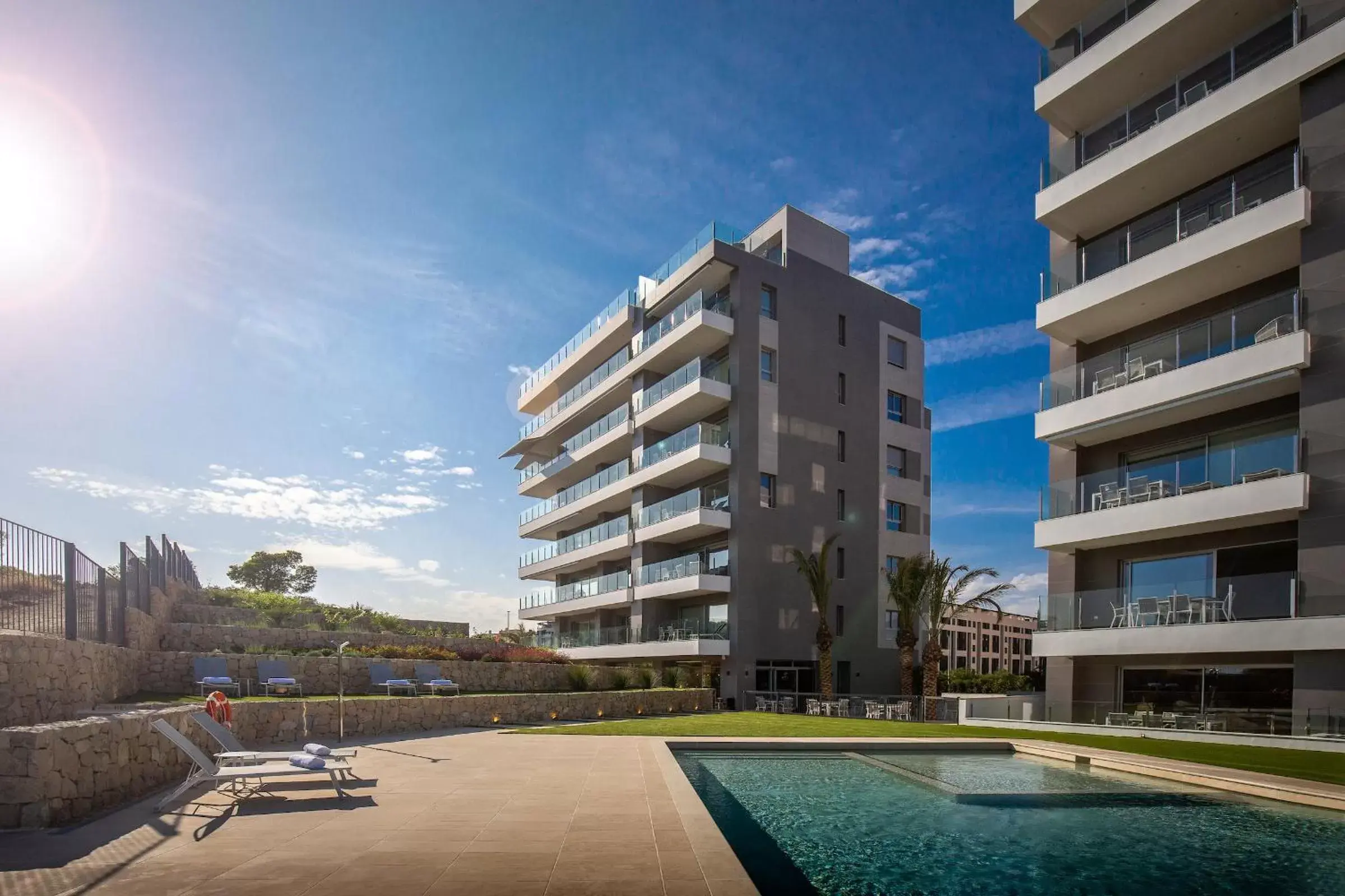 Swimming pool, Property Building in Blue Line Apartment Hotel