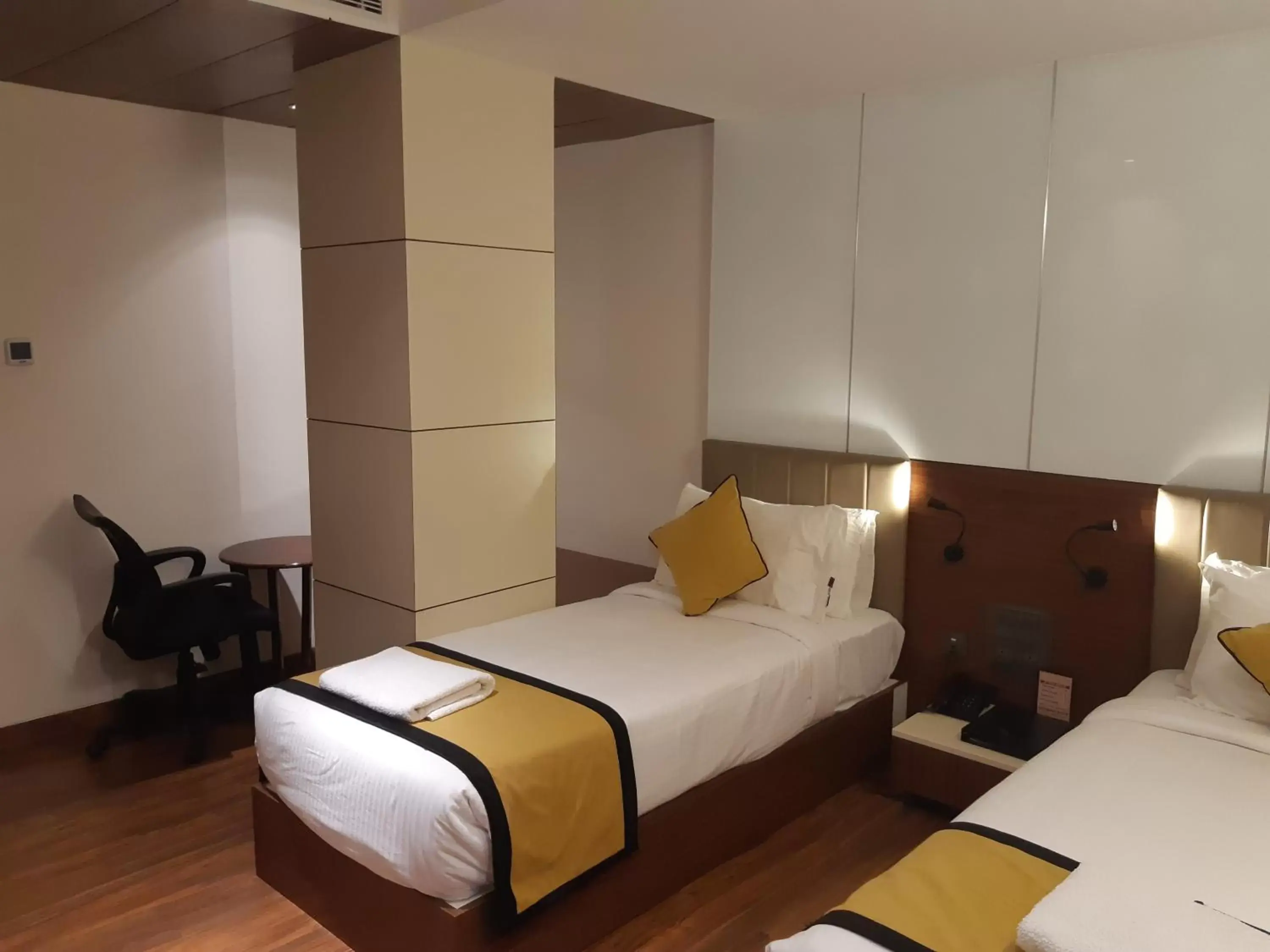 Bed in Hotel Namo Residency Bed in Hotel Namo Residency