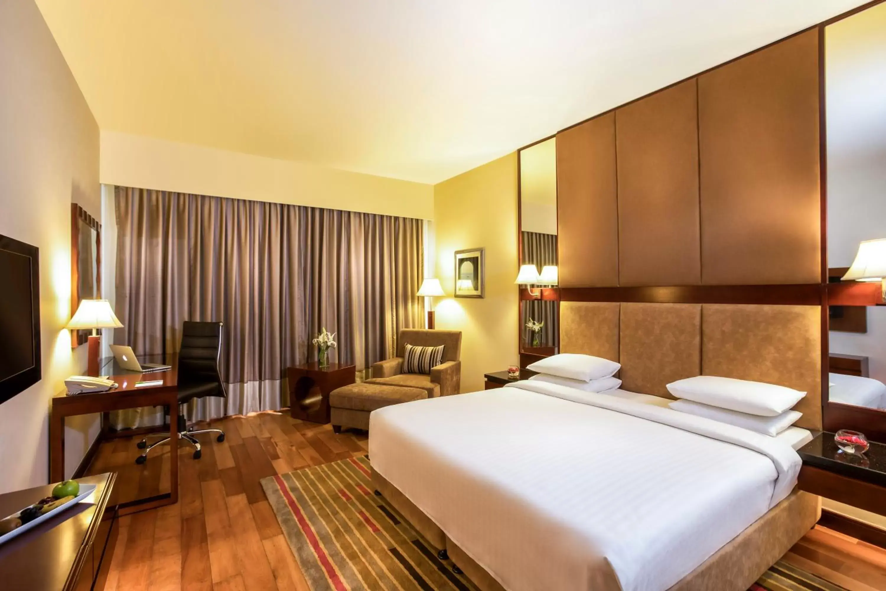 Bed in Courtyard by Marriott Ahmedabad