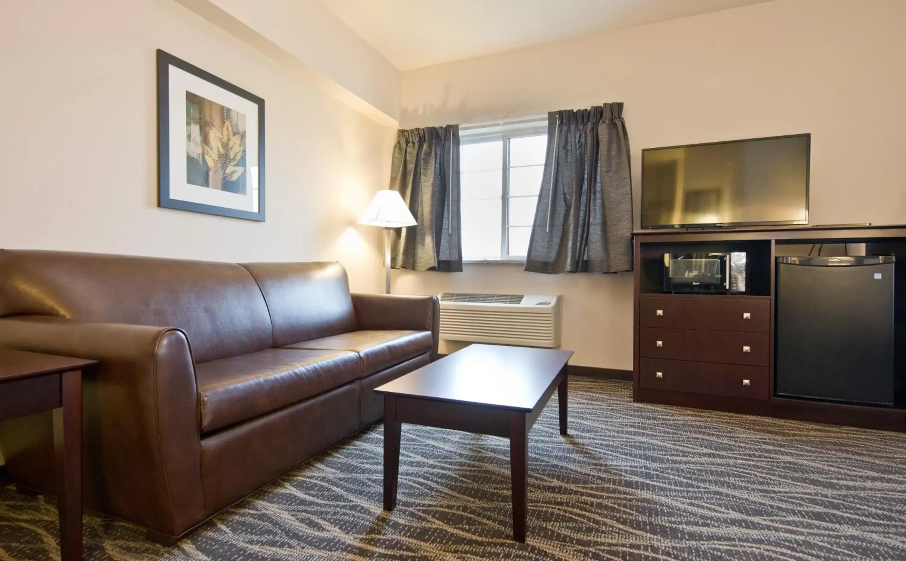 Bed, Seating Area in Cobblestone Inn & Suites - Boone