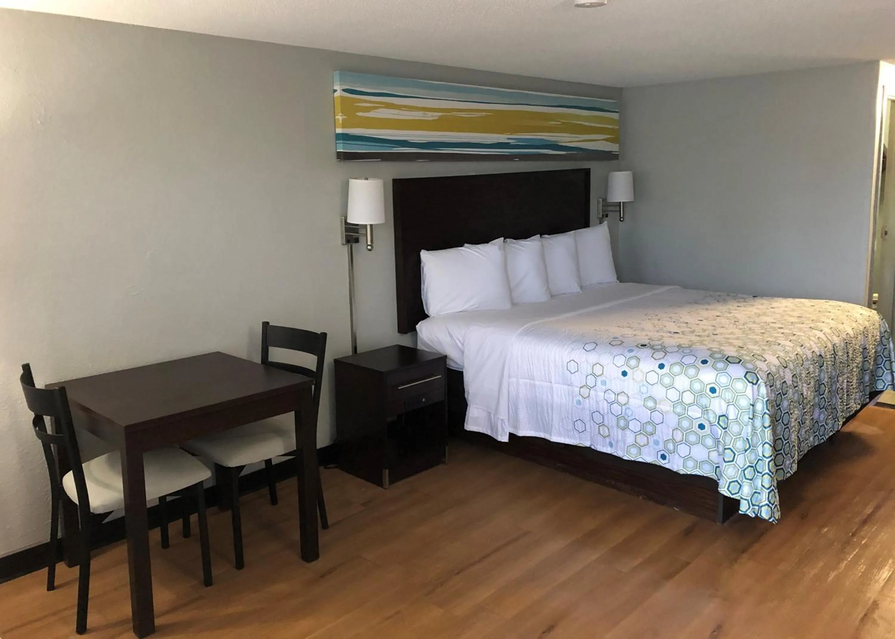 Bedroom, Bed in HomeTowne Studios by Red Roof Augusta