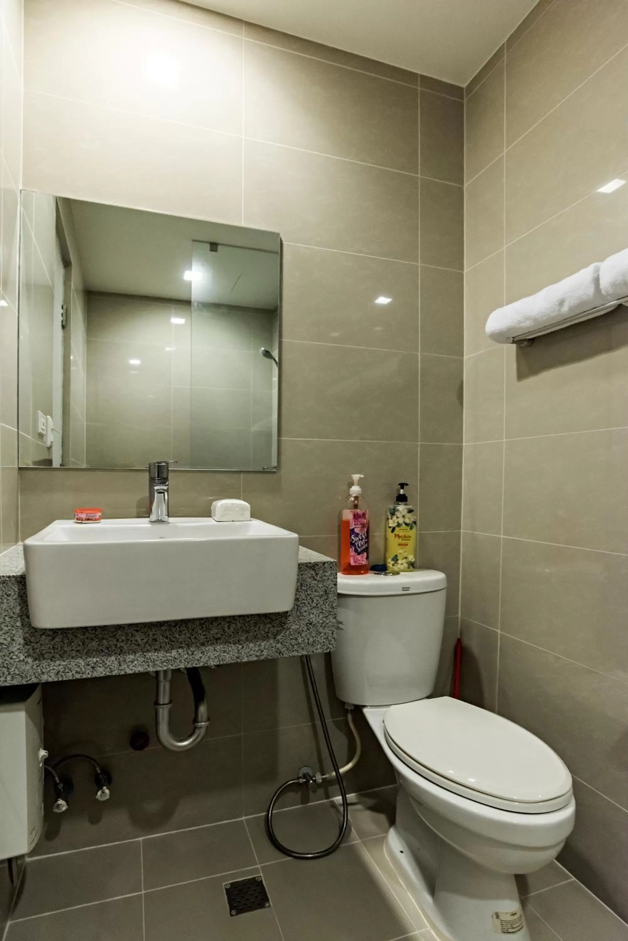 Shower in 1BR Suite in Uptown BGC