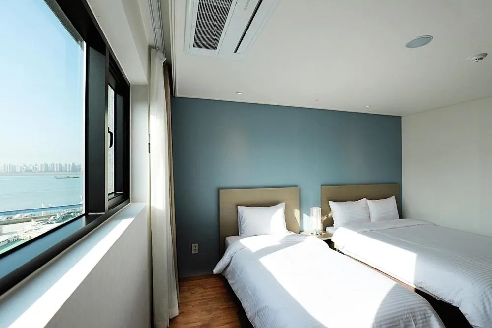 Bedroom, Bed in Sea Moon Tourist Hotel