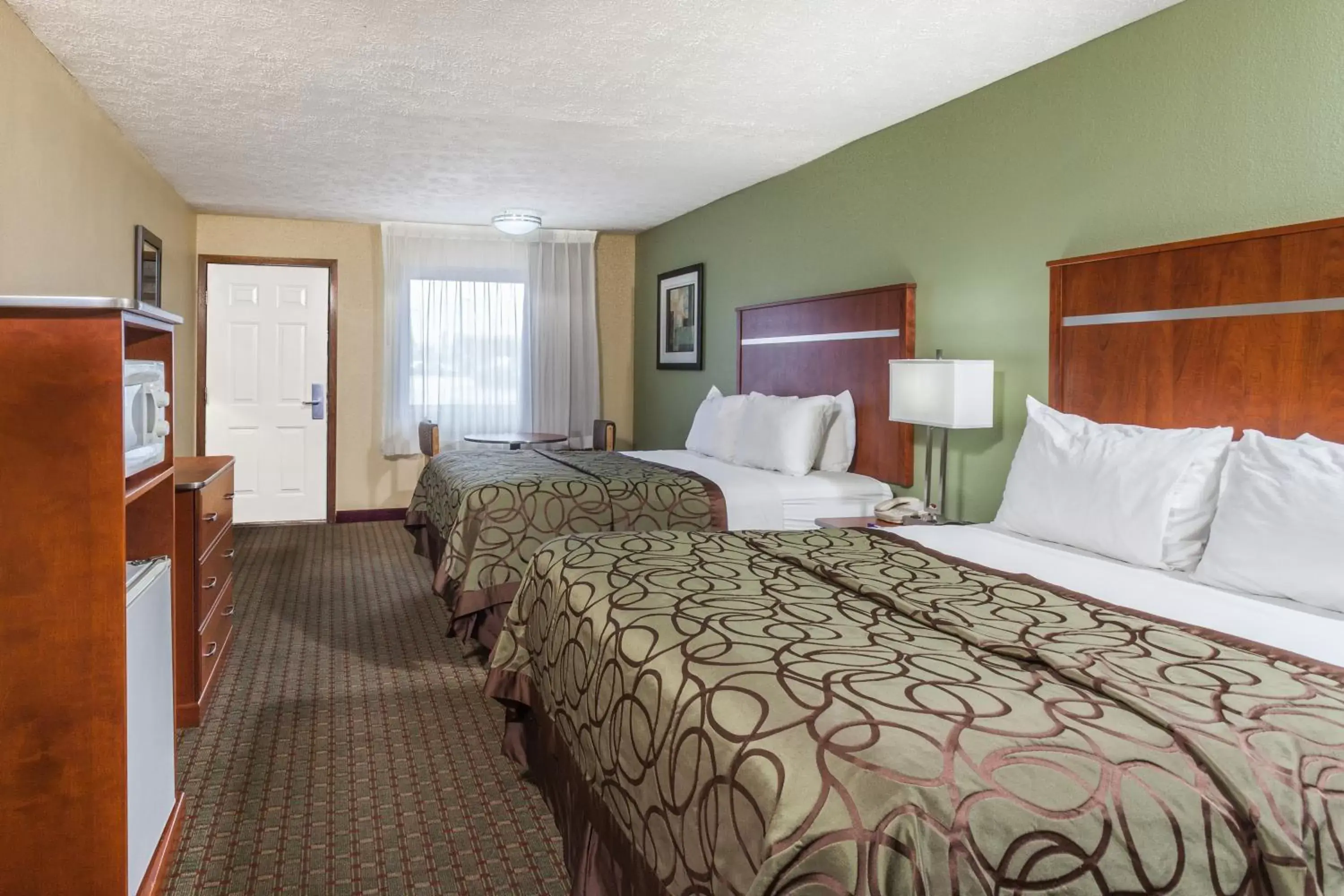 Photo of the whole room, Bed in Baymont by Wyndham Pigeon Forge near Island Drive