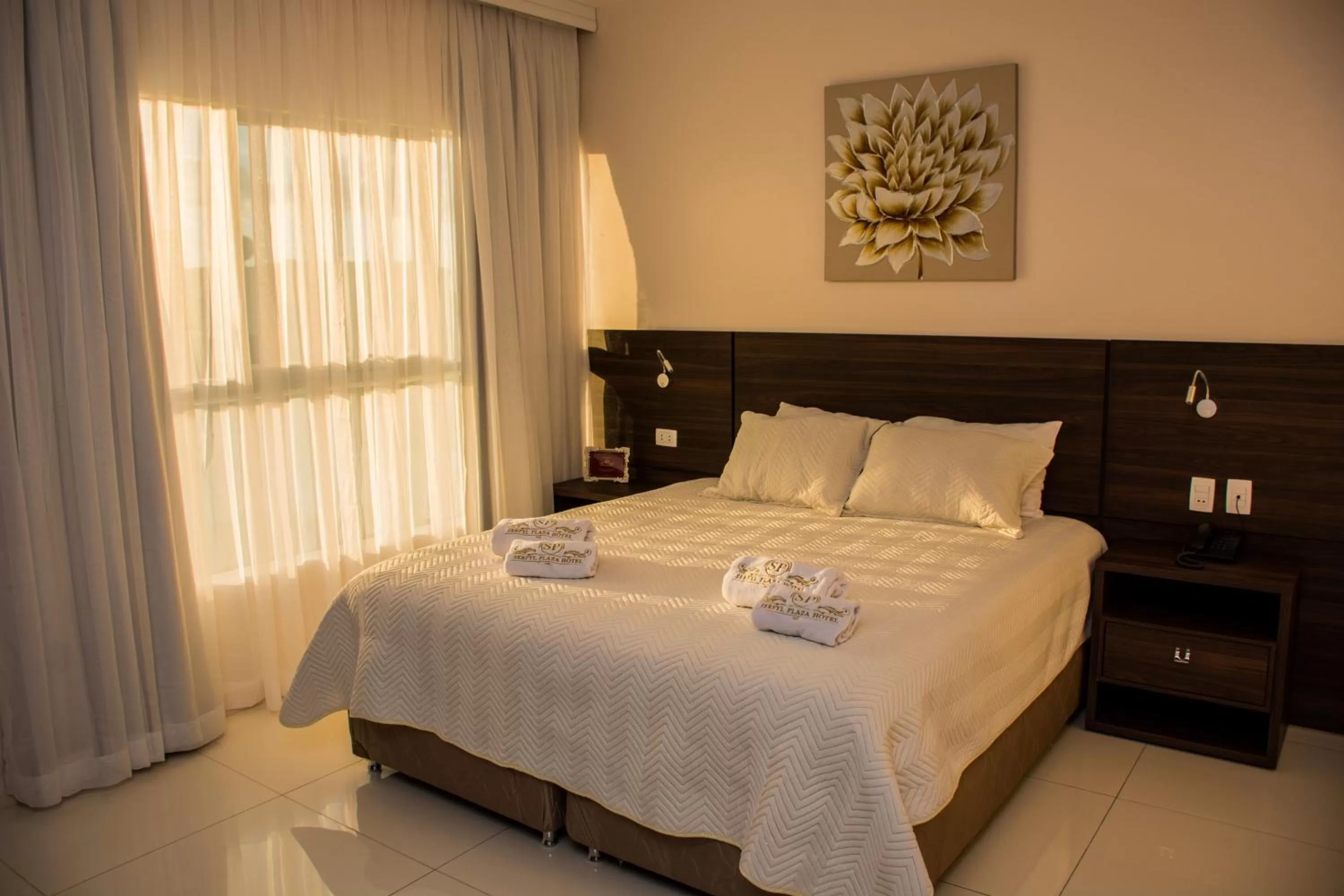 Bed in SERPYL Plaza Hotel