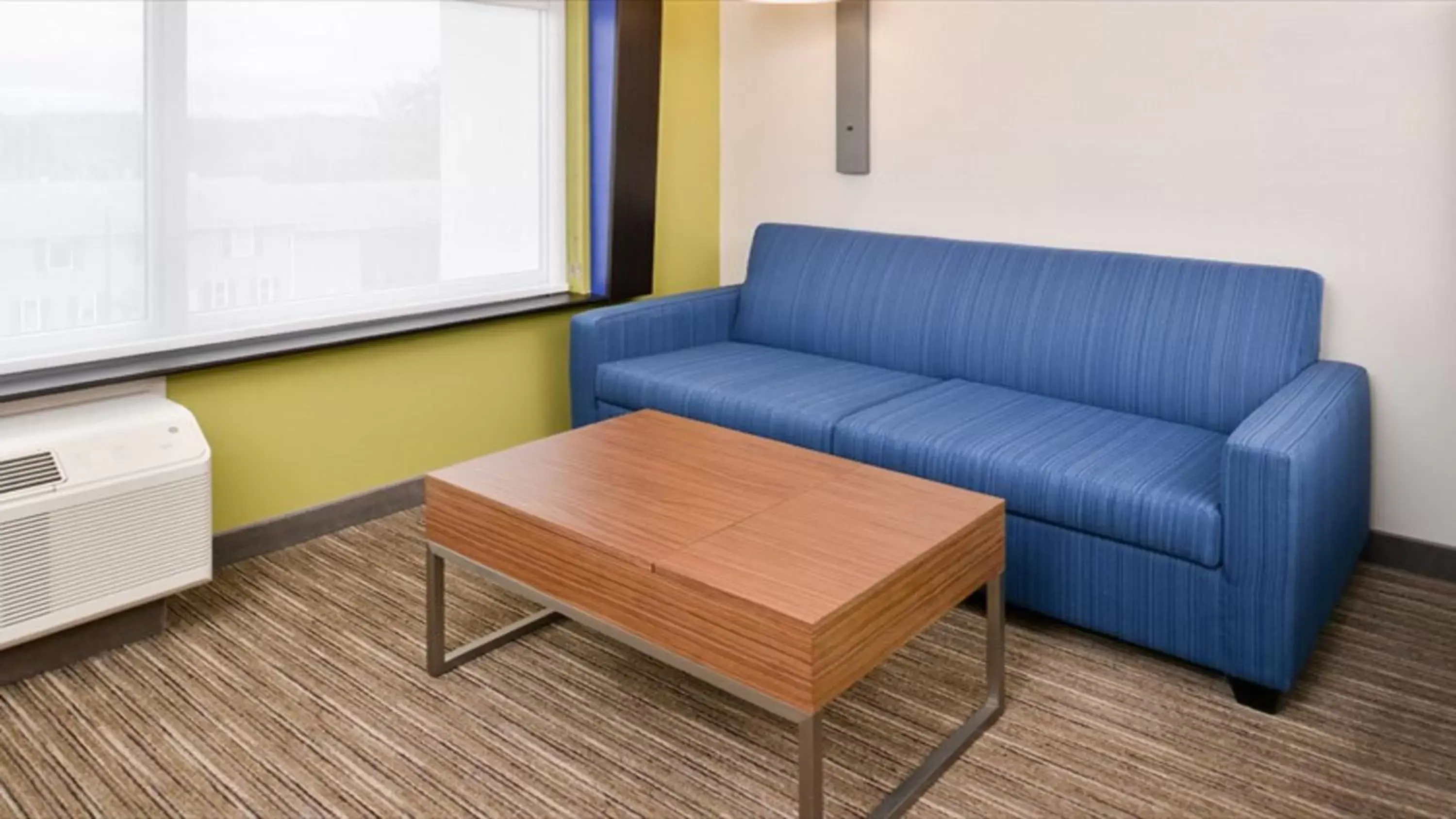 Photo of the whole room, Seating Area in Holiday Inn Express & Suites - Parkersburg East, an IHG Hotel