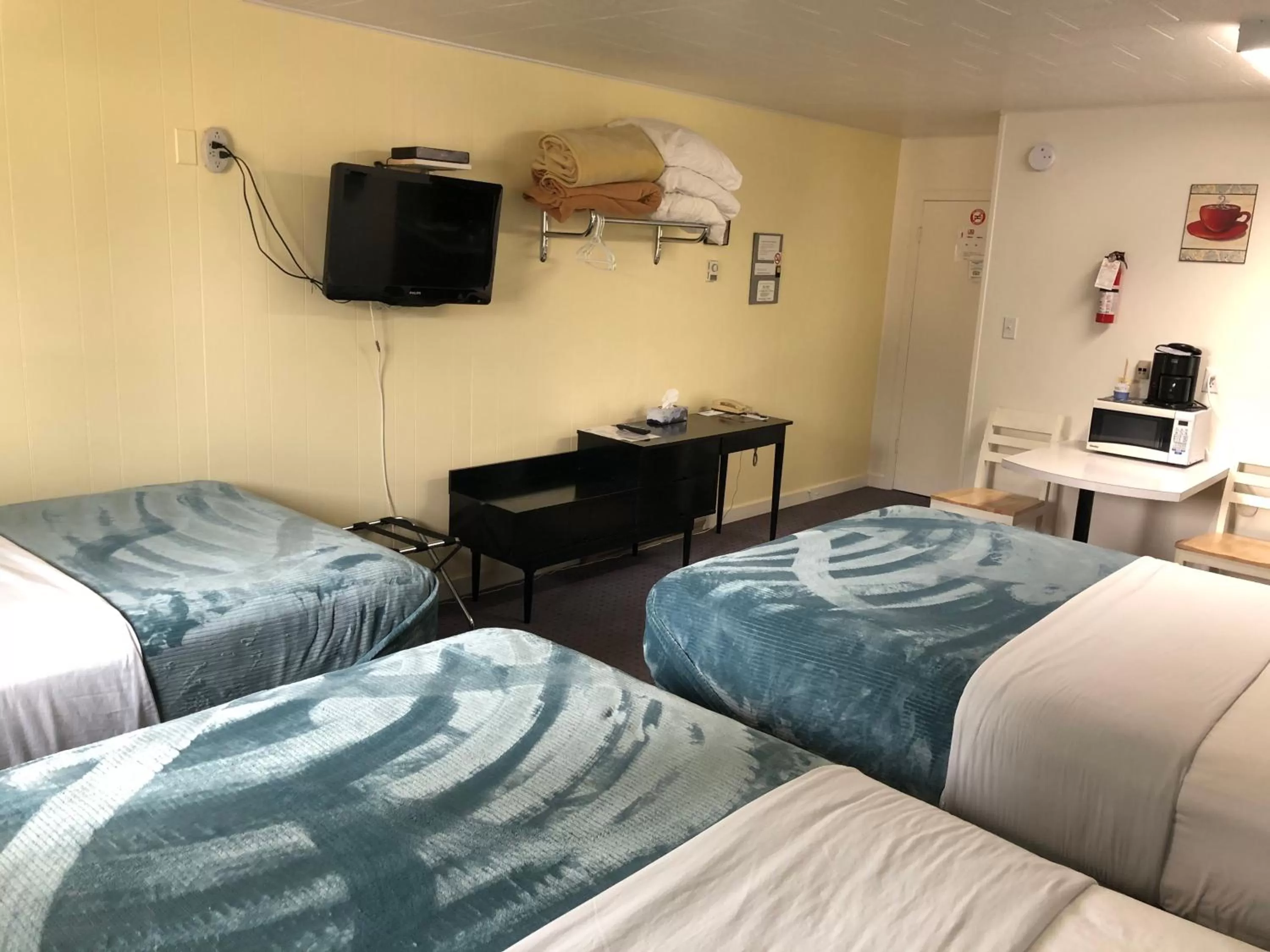 Bed in Creston Valley Motel