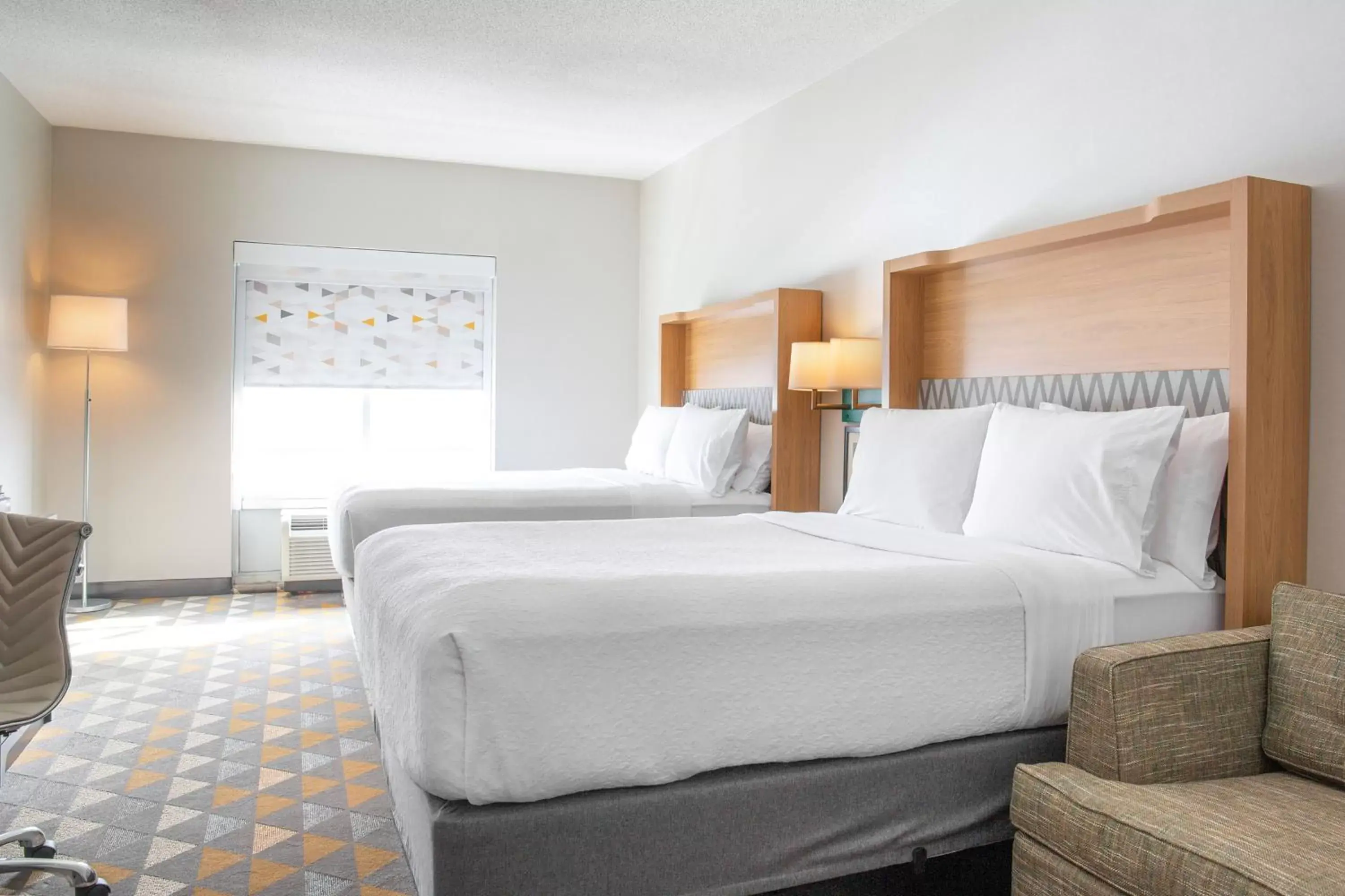 Bedroom, Bed in Holiday Inn Toledo - Maumee I-80/90, an IHG Hotel