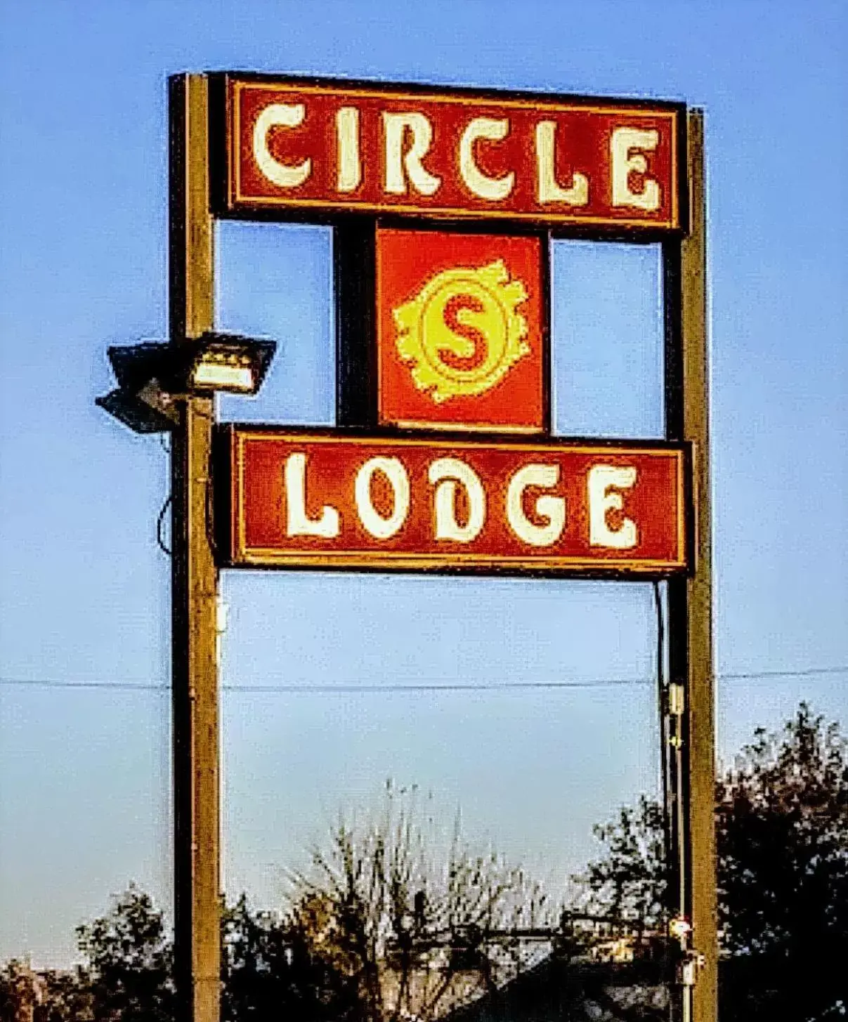 Property logo or sign in Circle S Lodge