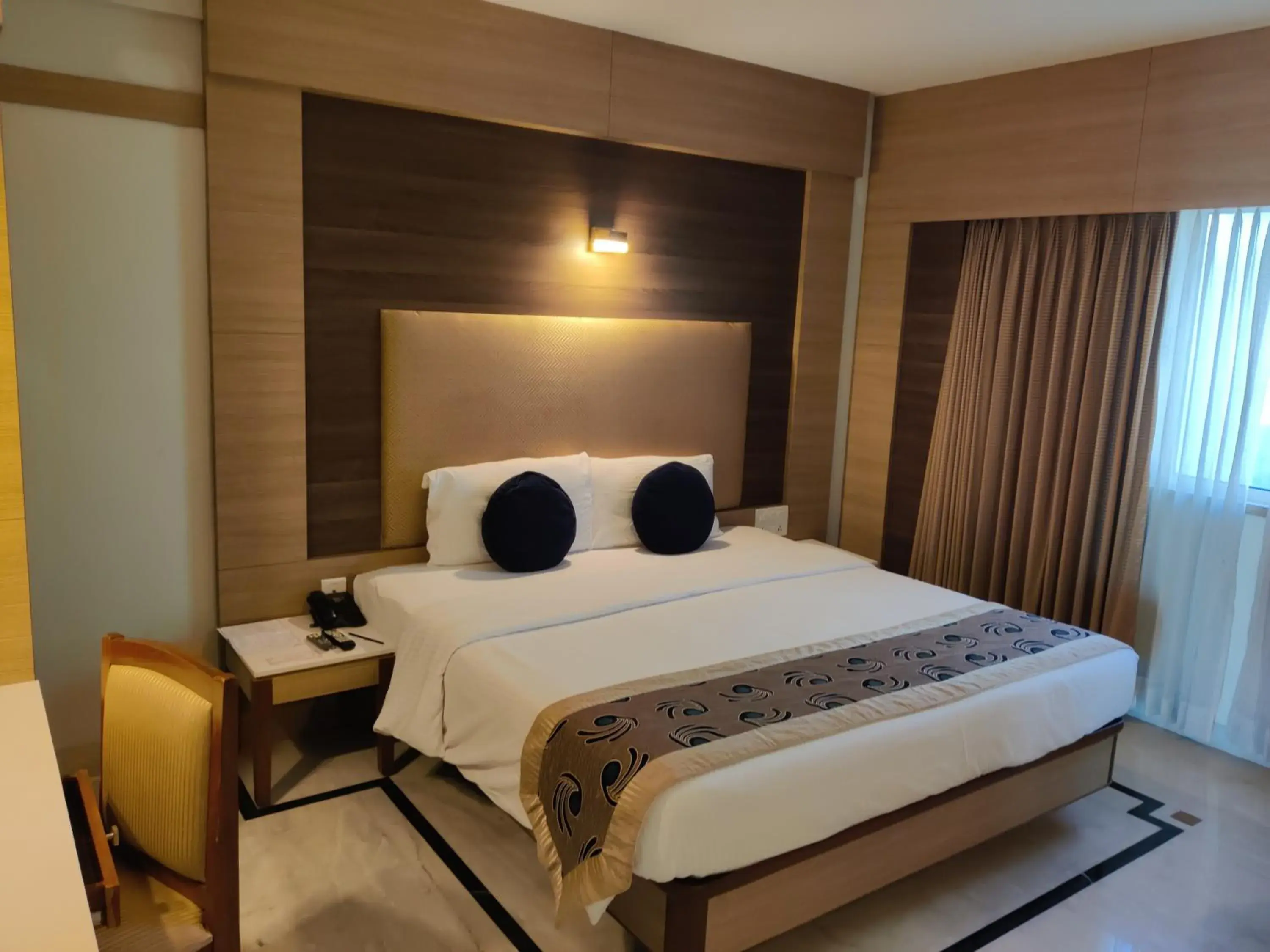 Bed in JP Hotel in Chennai