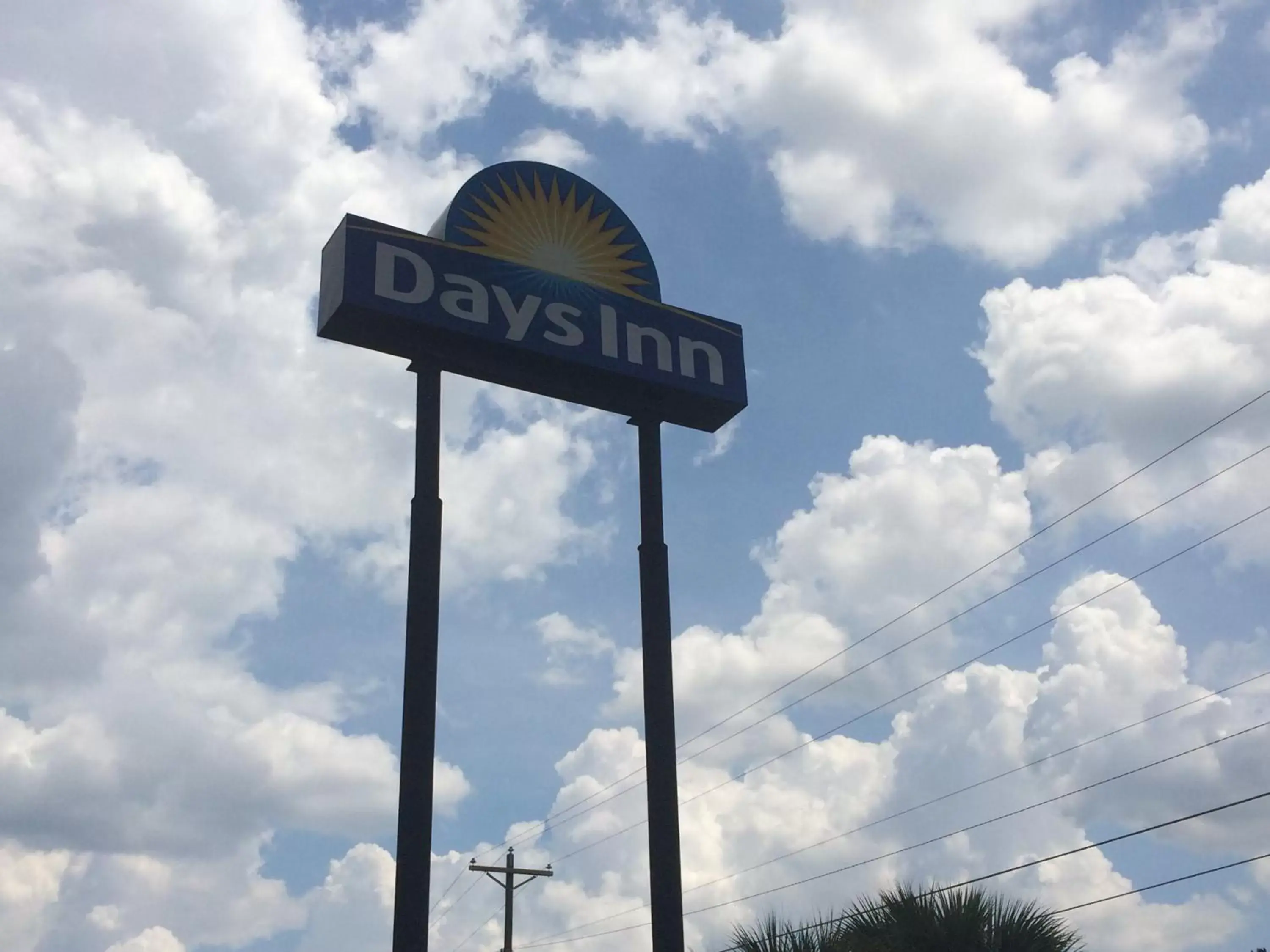 Property logo or sign in Days Inn by Wyndham Columbia NE Fort Jackson