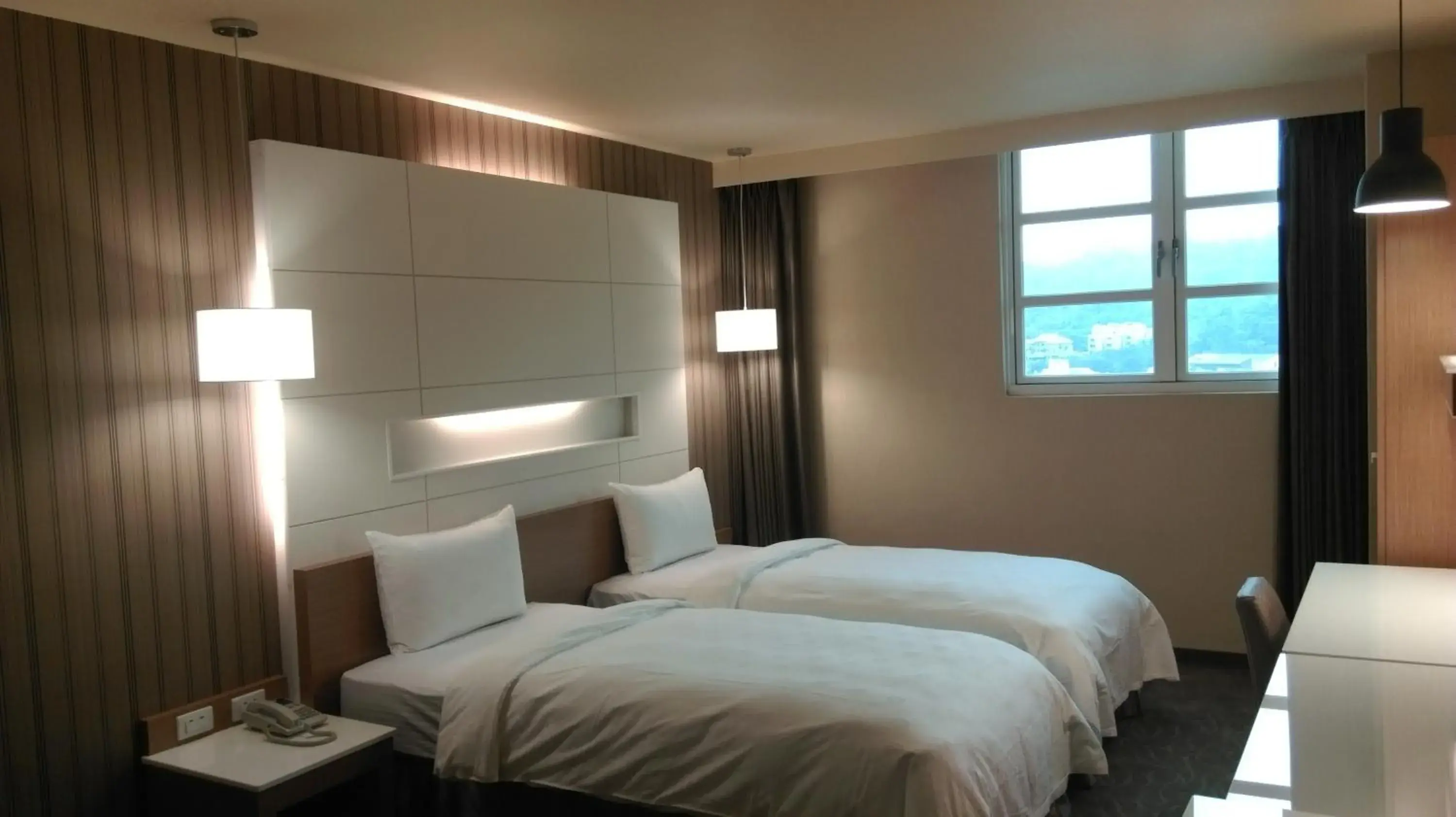 Bed in Kindness Hotel Hualien