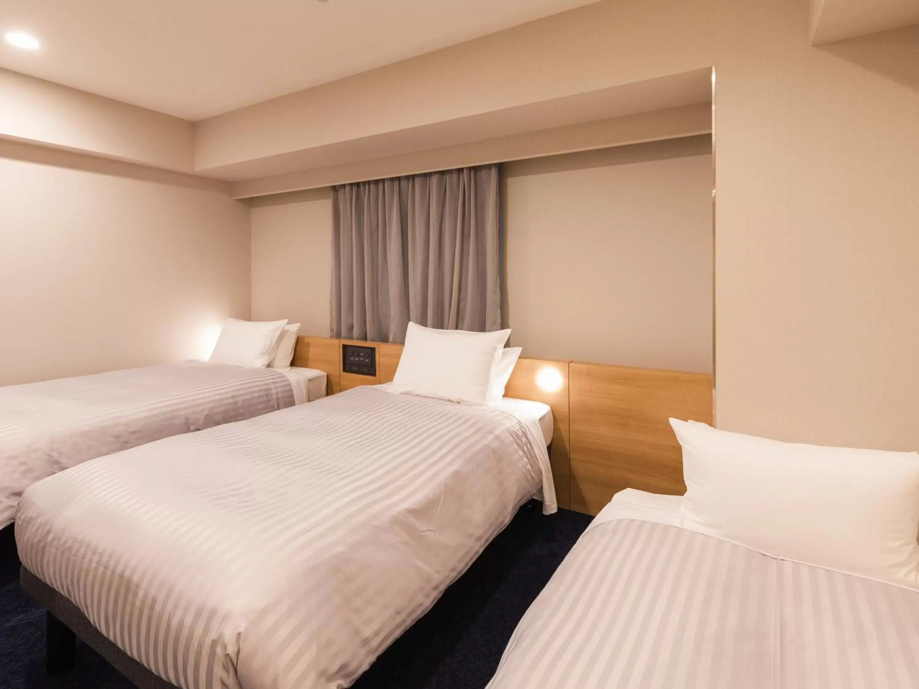 Photo of the whole room, Bed in Sotetsu Fresa Inn Nagoya-Shinkansenguchi